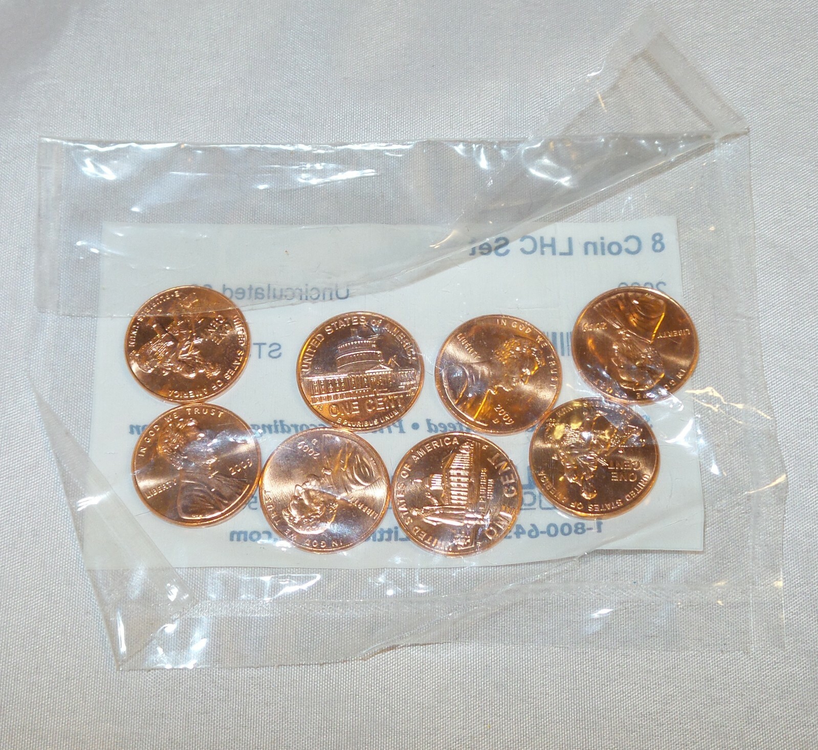 Lot of 8 Lincoln Bicentennial Pennies 2009  - Littleton Coin Co. - Sealed!