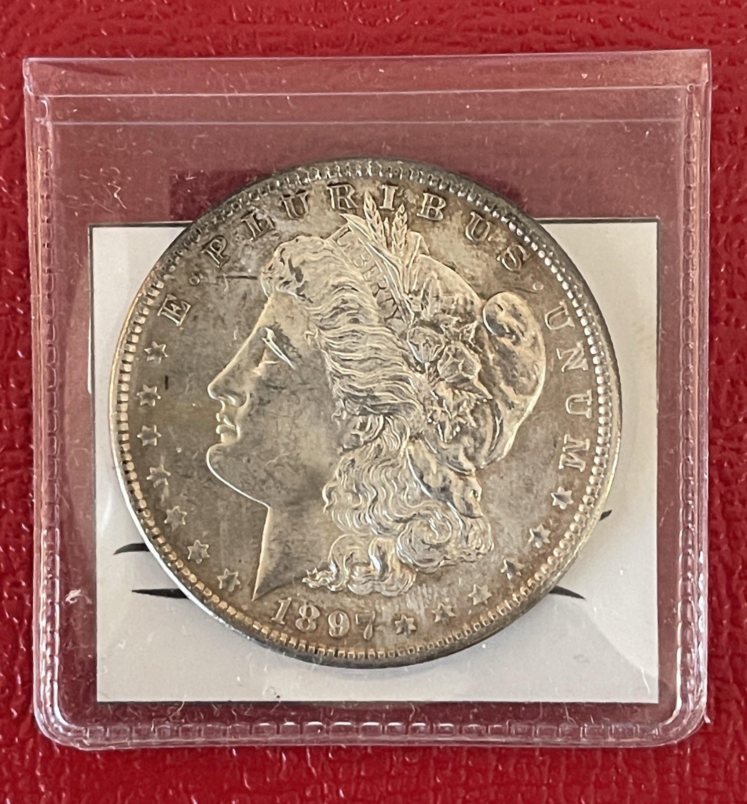 1897 P Morgan Silver Dollar, Choice to Gem Uncirculated.