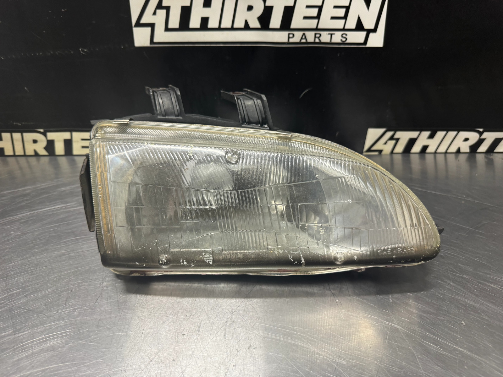 92-95 HONDA CIVIC COUPE/HATCHBACK RH PASSENGER STANLEY GLASS HEADLIGHT OEM #N211