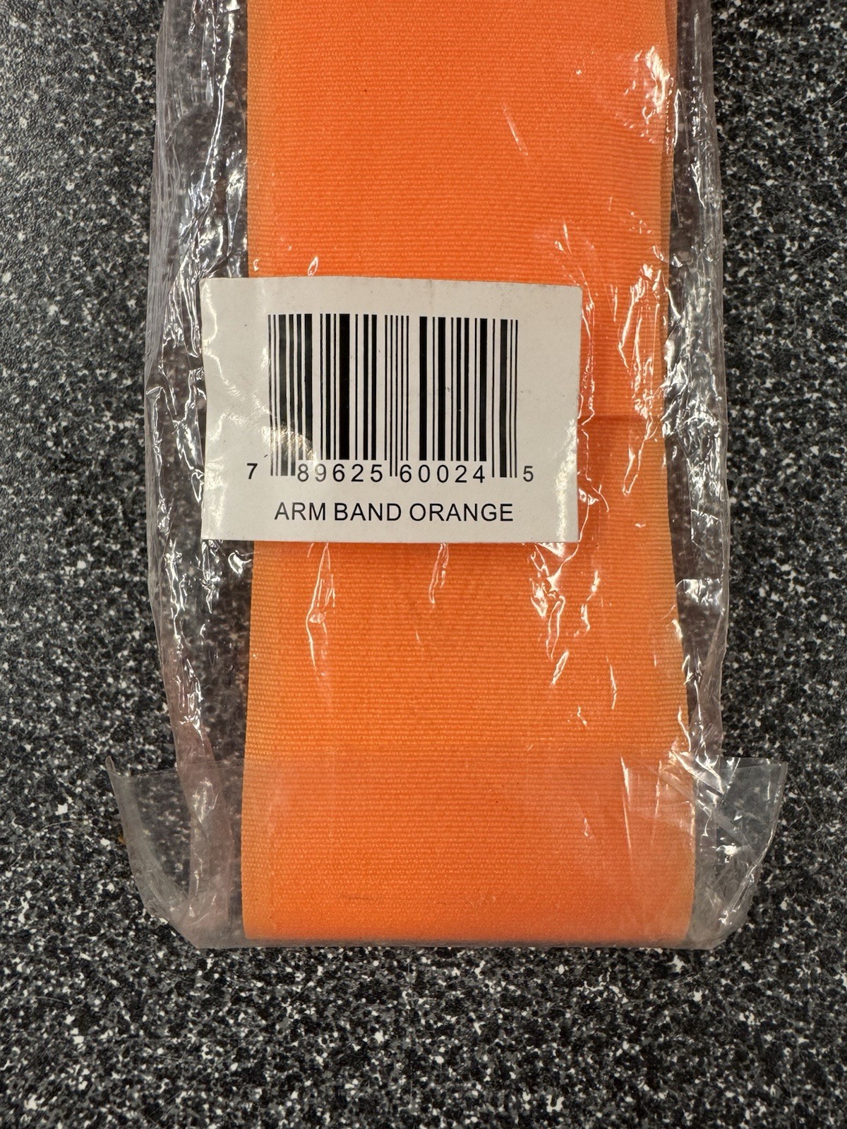 Orange arm band. OSFM. NOS.