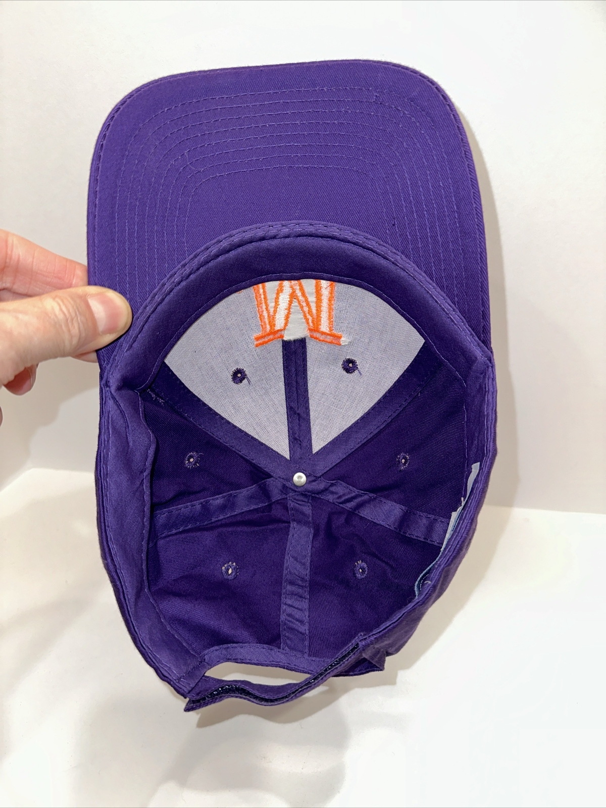 Purple Hat Cap with Orange Capitol M on the front Hook Loop