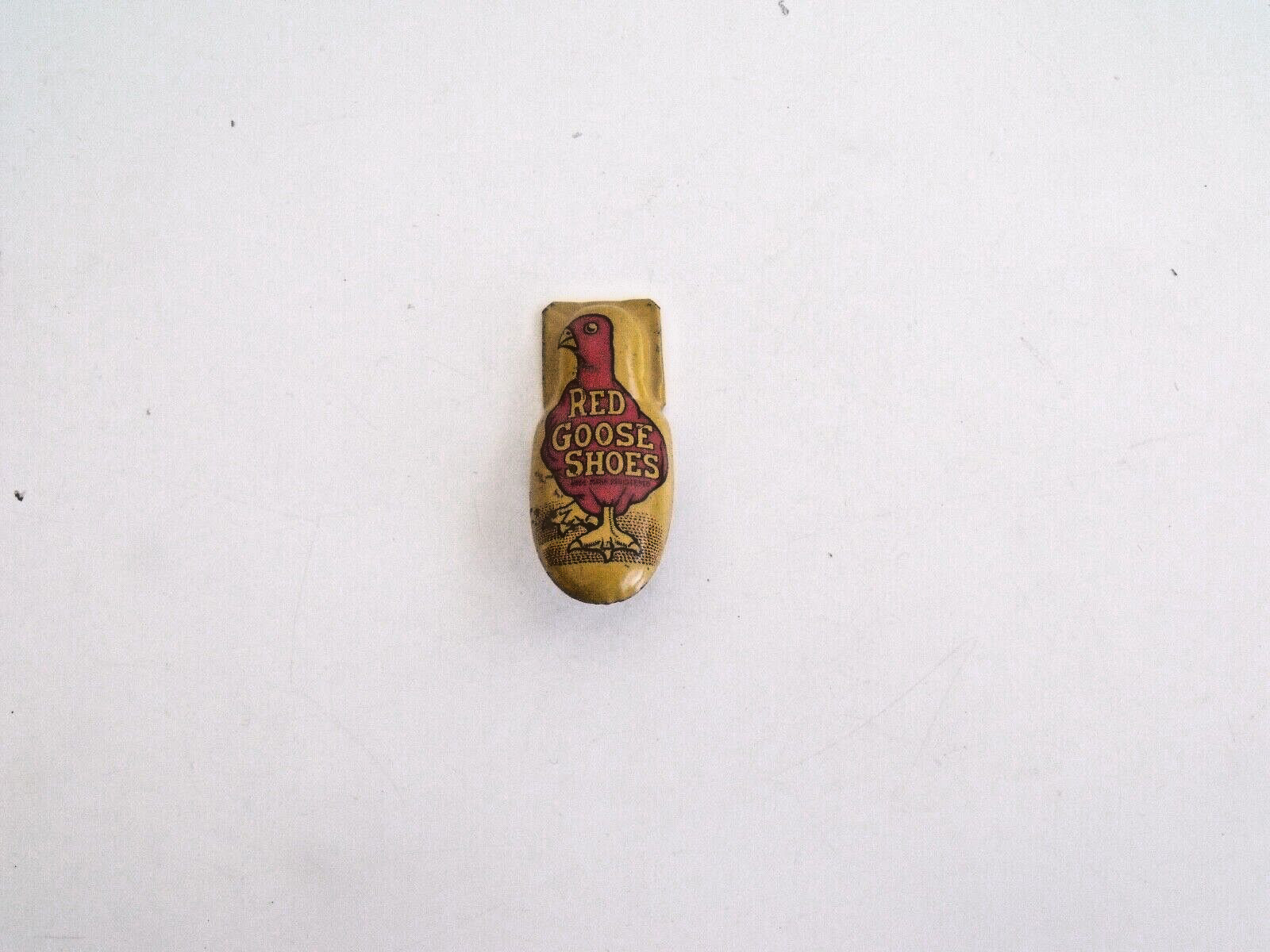 VTG Red Goose Shoes Advertising Tin Clicker