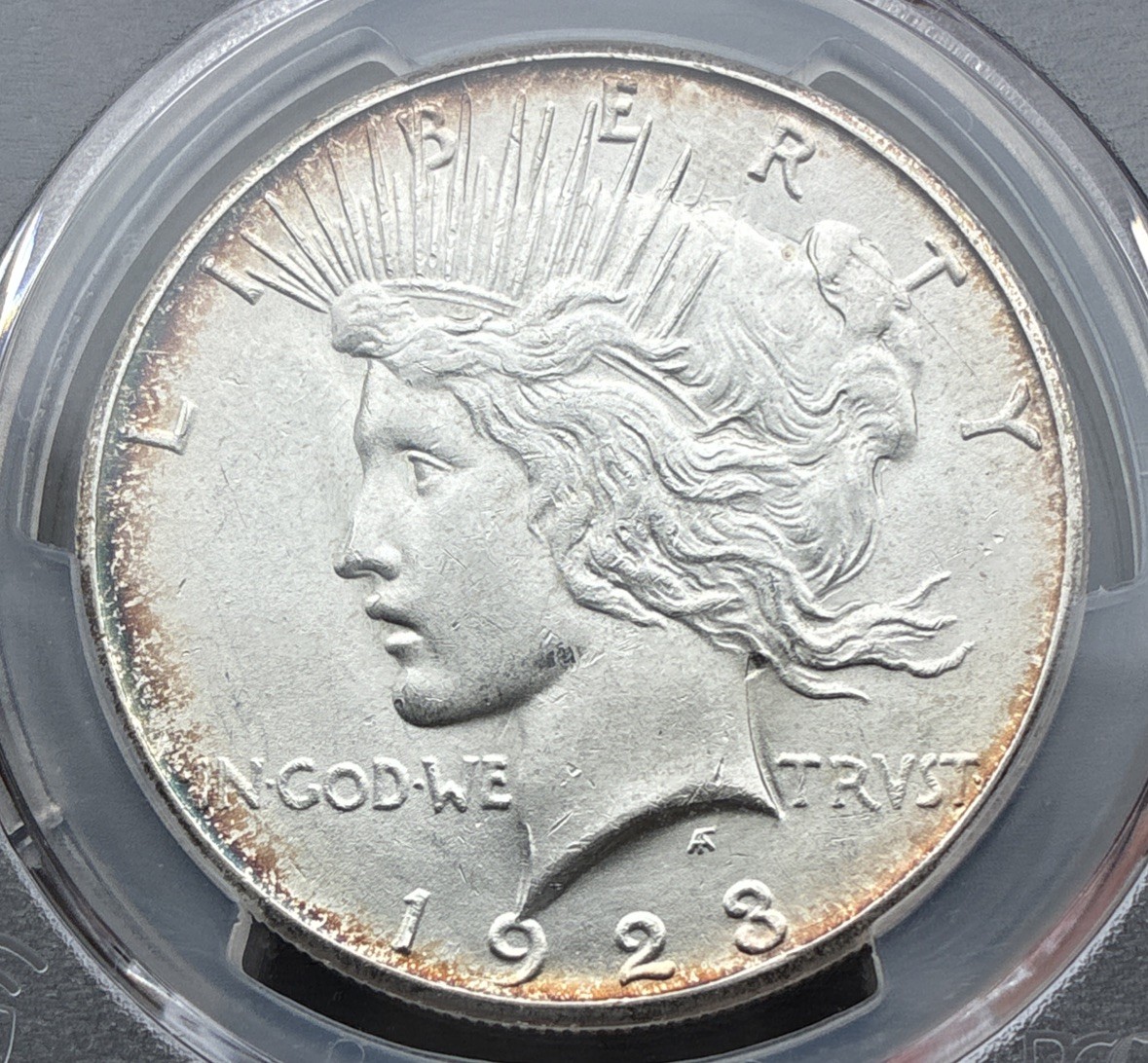 1923-S TONED PCGS MS62 Peace Silver Dollar