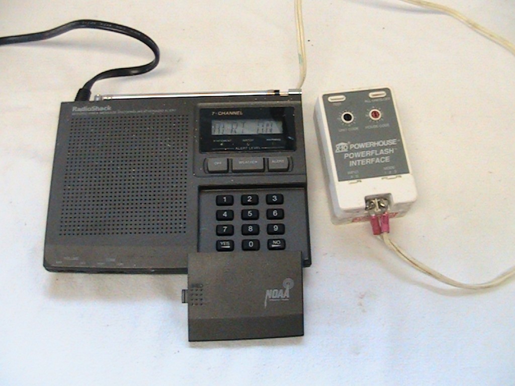 1 USED RADIO SHACK WEATHER RADIO #12-250 WITH POWERHOUSE INTERFACE PF284