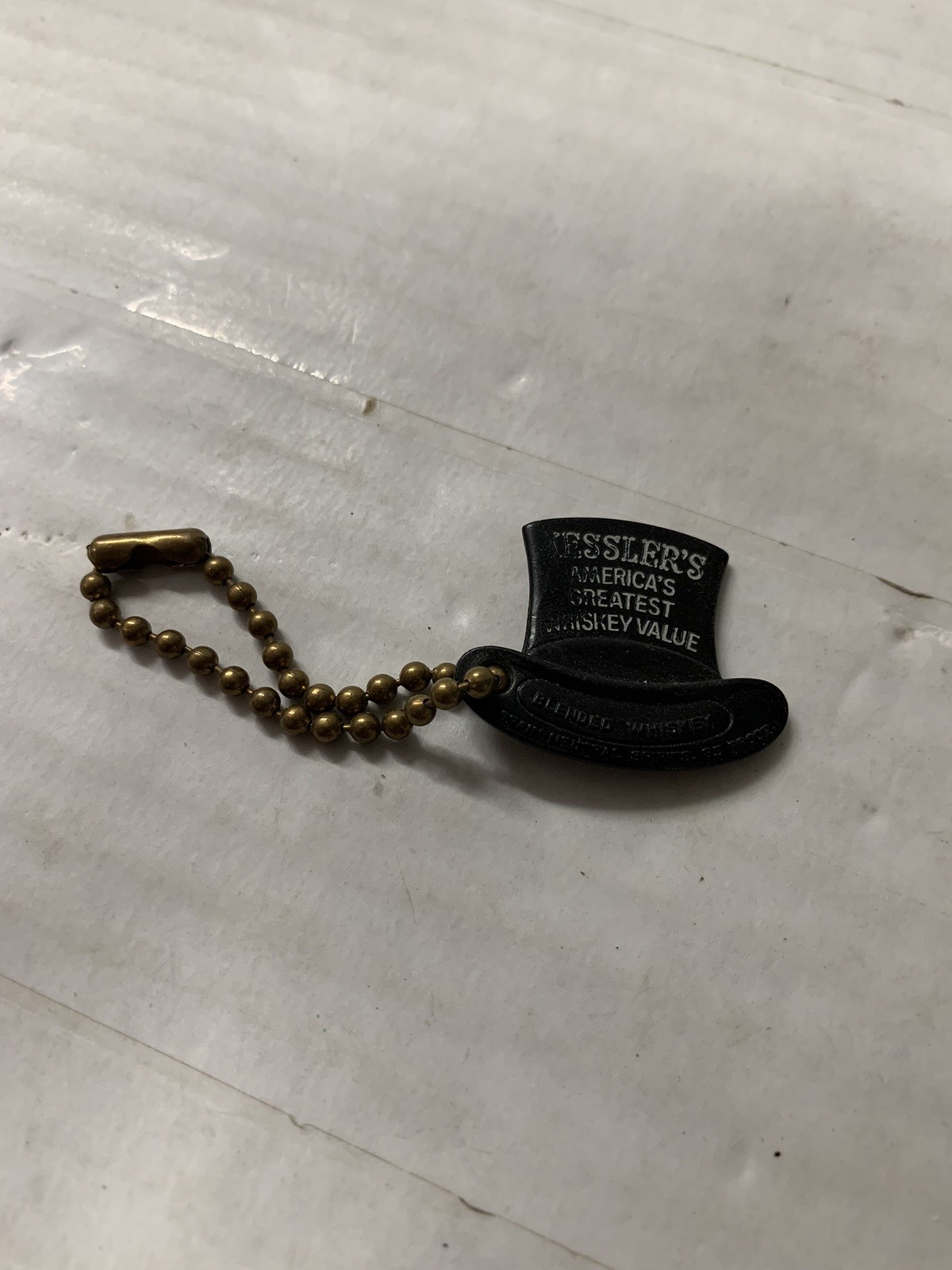 Vintage Kessler's Whiskey Smooth As Silk Plastic Keychain Hat Logo