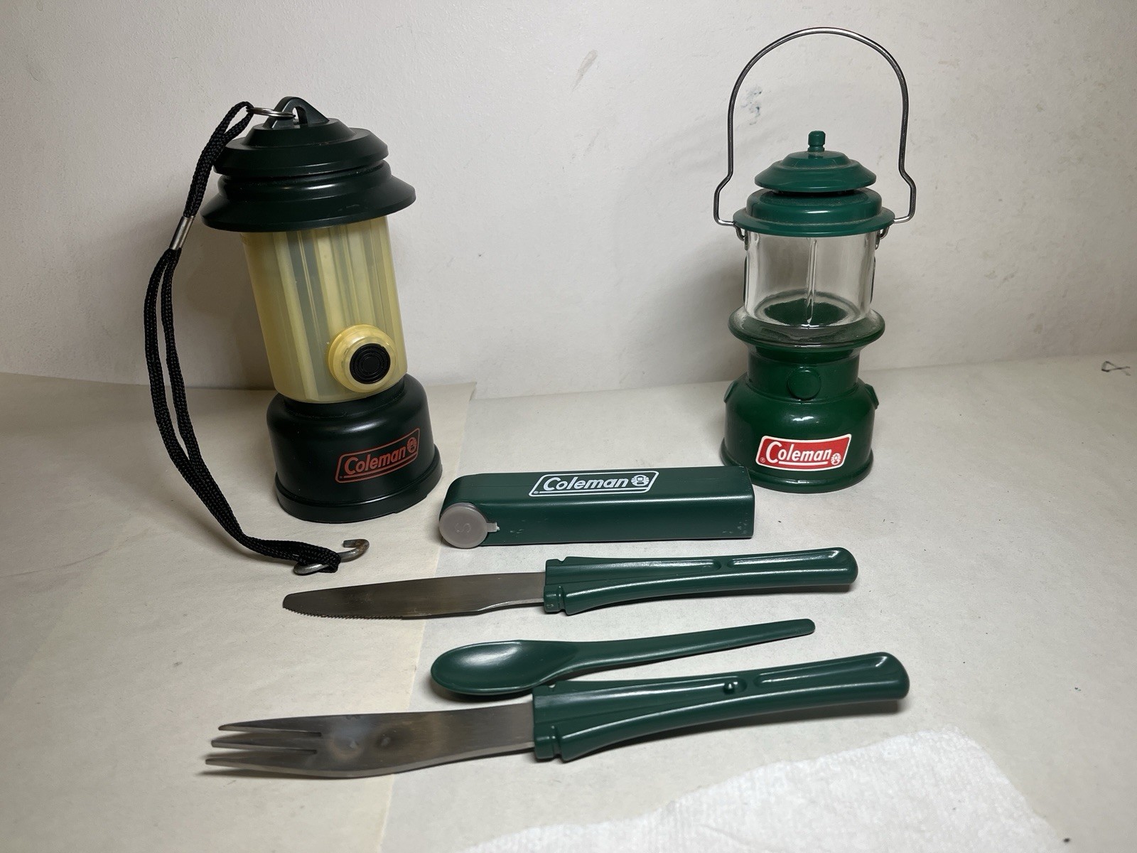 Coleman Lantern Battery Operated & Avon Coleman Cologne  & Coleman Silverware