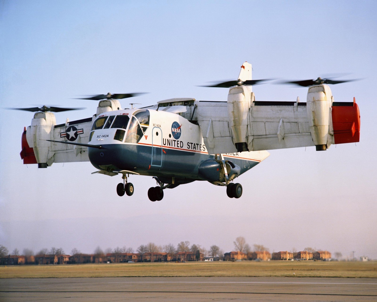 LING-TEMCO-VOUGHT XC-142A AIRCRAFT AT LANGLEY CENTER - 8X10 NASA PHOTO (BB-351)