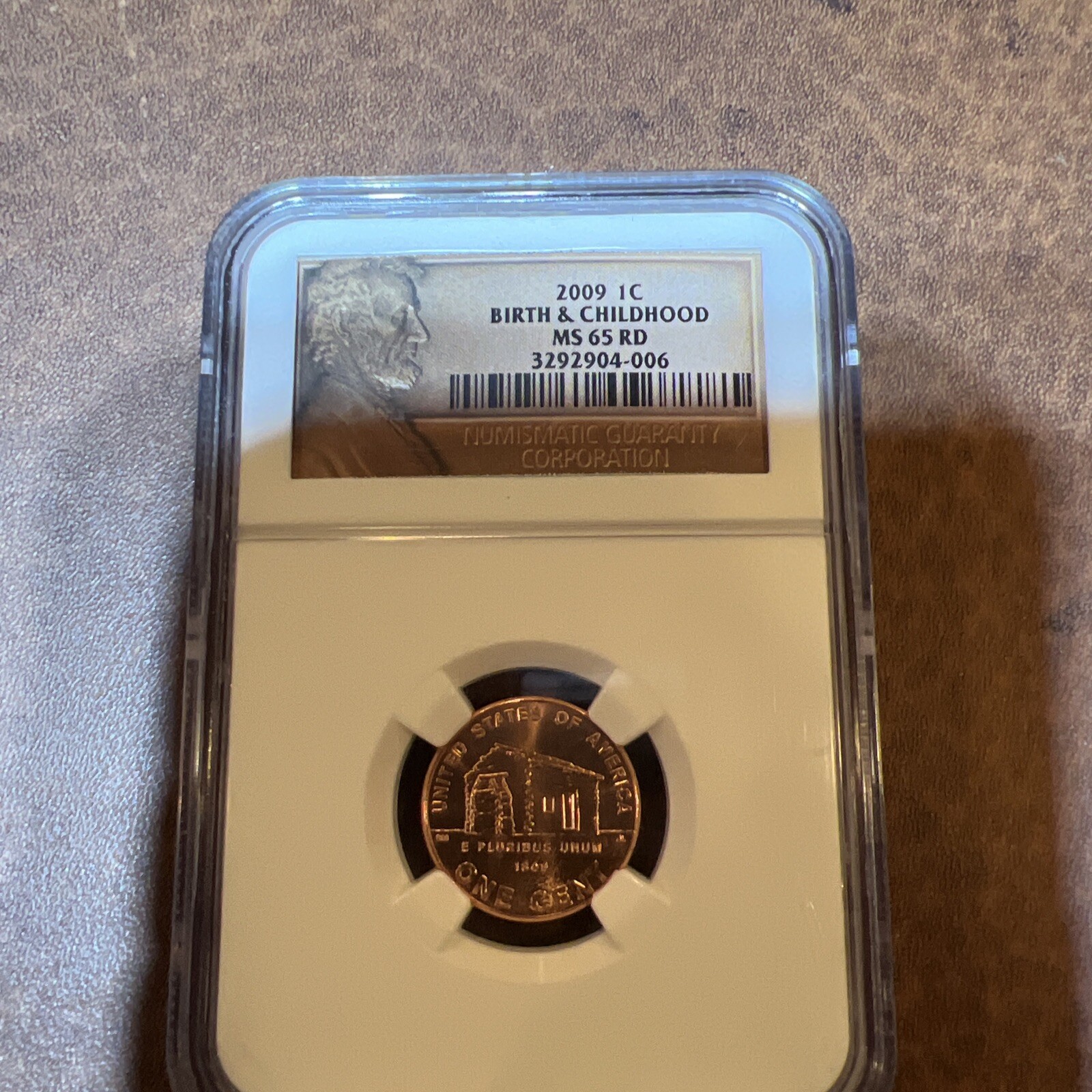 2009 Birth & Childhood 1C NGC MS 65 RD Lincoln Label