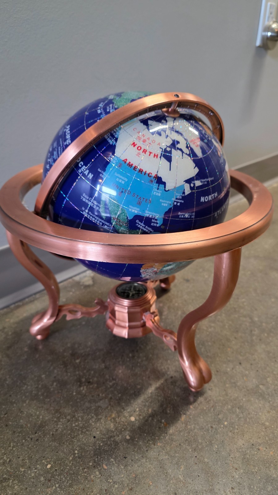 World Globe - Plastic Copper Rotating Base. From China