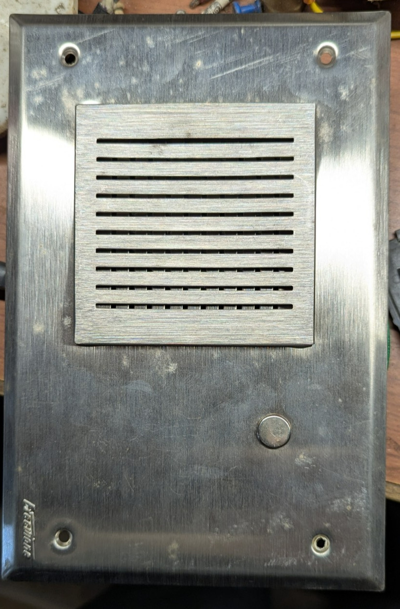 Executone intercom wall mount speaker system on brushed stainless steel plate