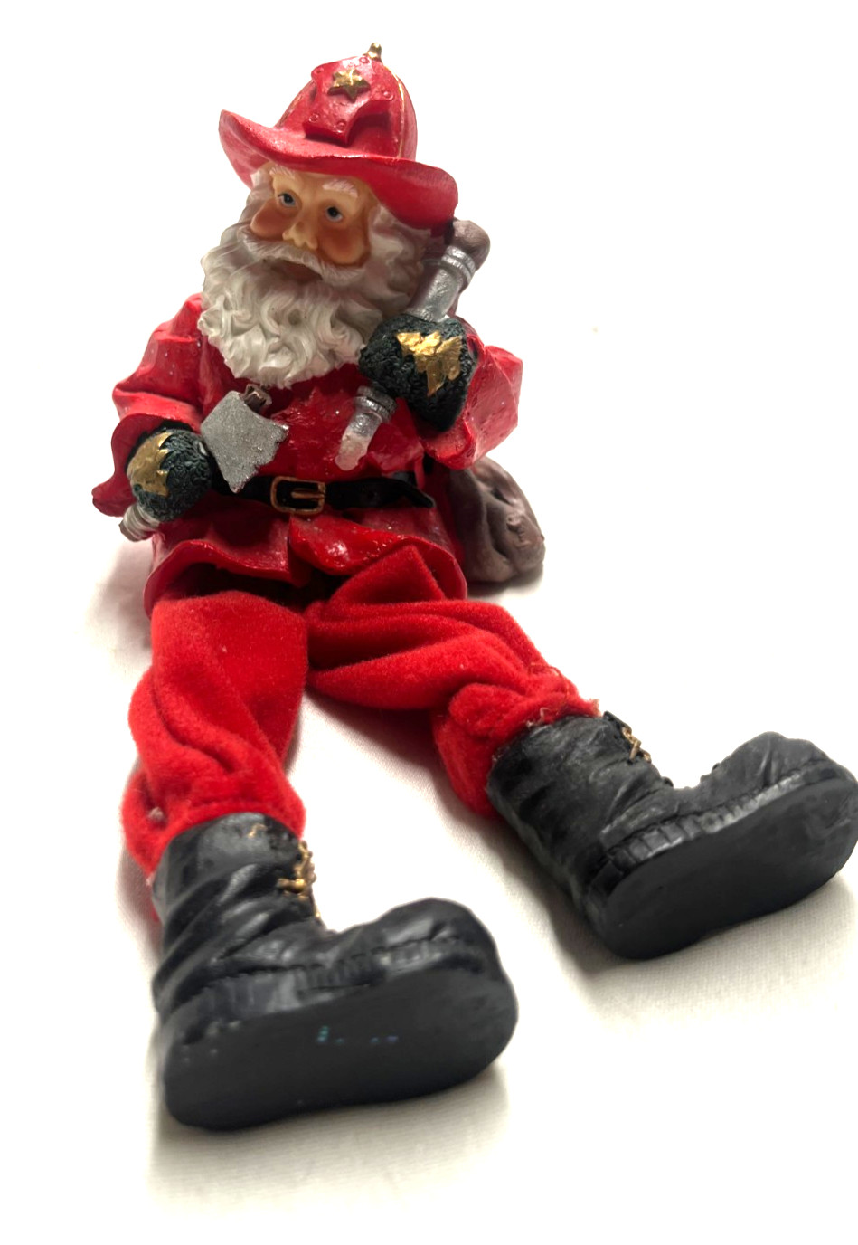 Edge Sitting Fireman Santa