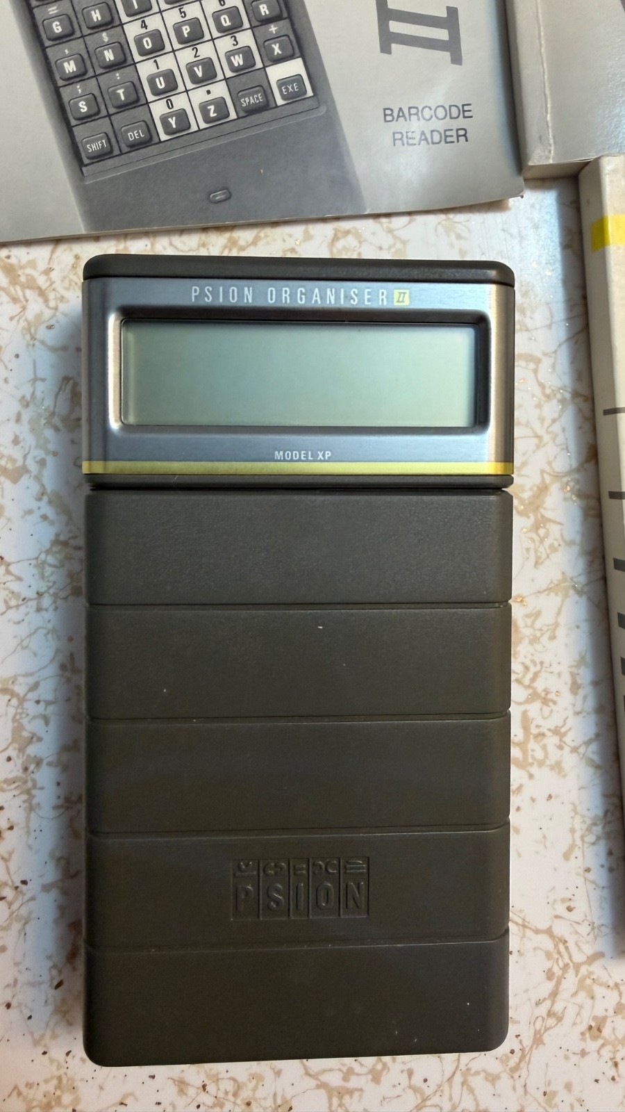 Psion Organiser II with powered comms link cable/charger 8K data pack