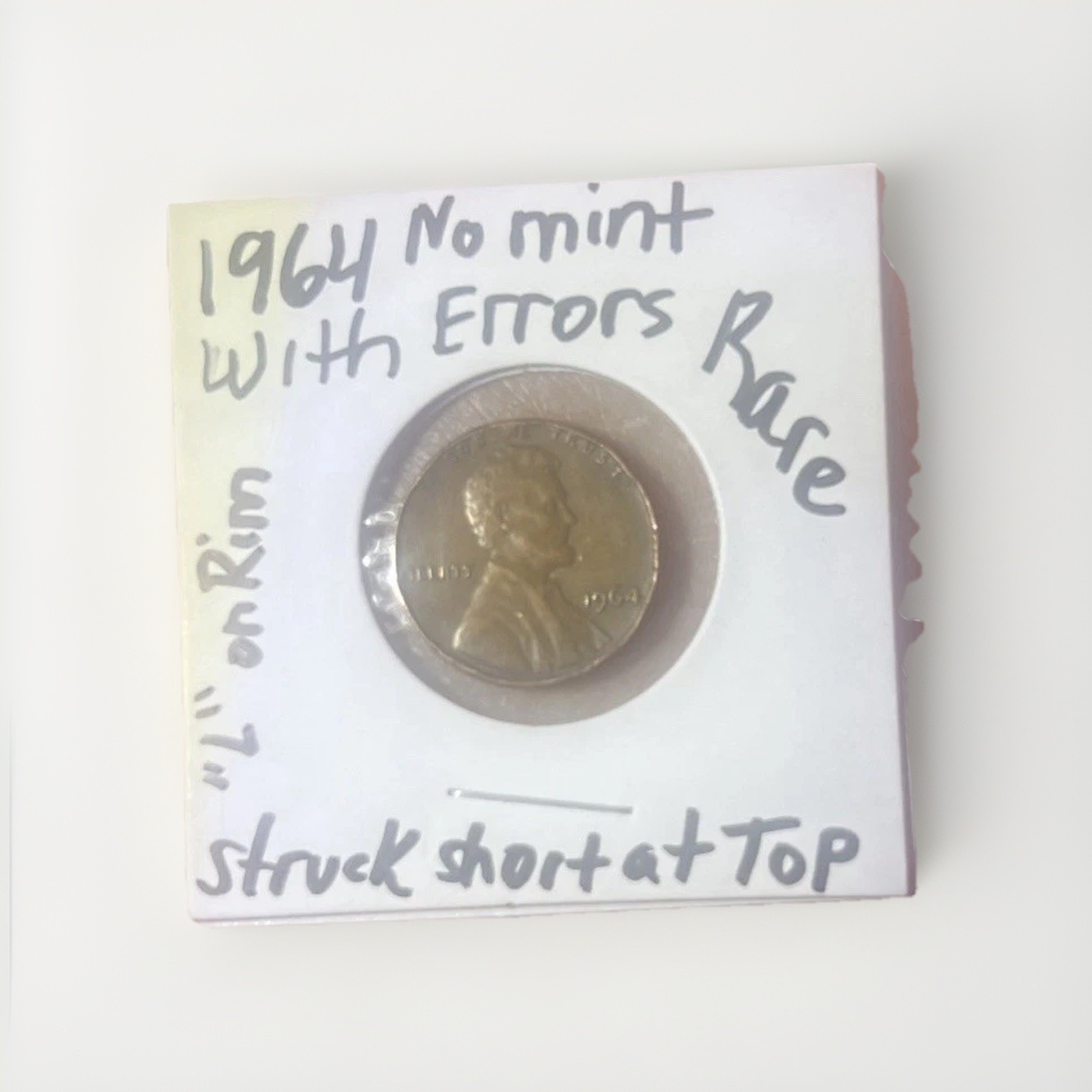 1964 Lincoln Memorial Penny with Error"L" in Liberty is on the rim. No Mint Mark