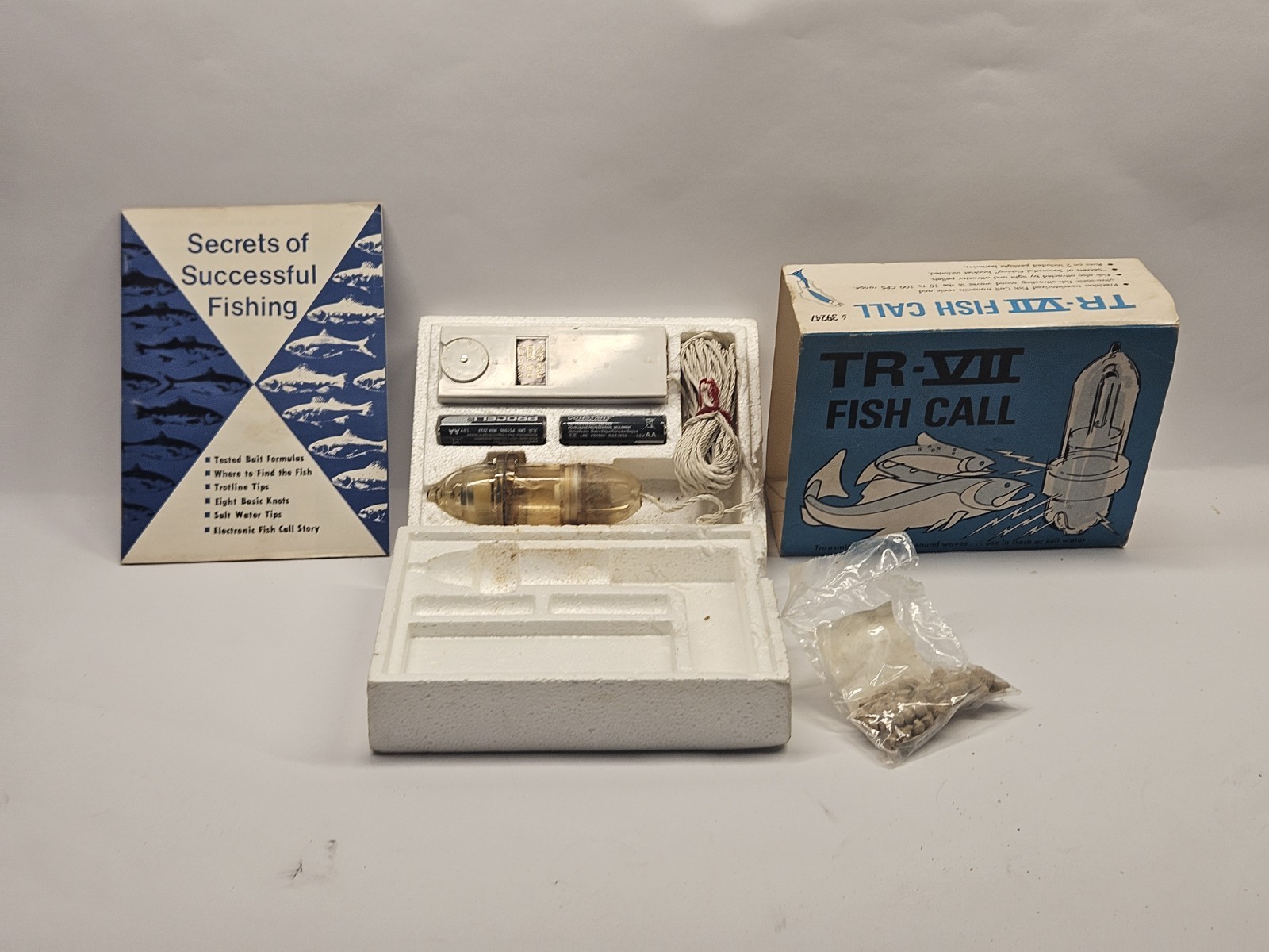 Vintage TR VII Fish Call in Box with Instructions and Bait Tablets