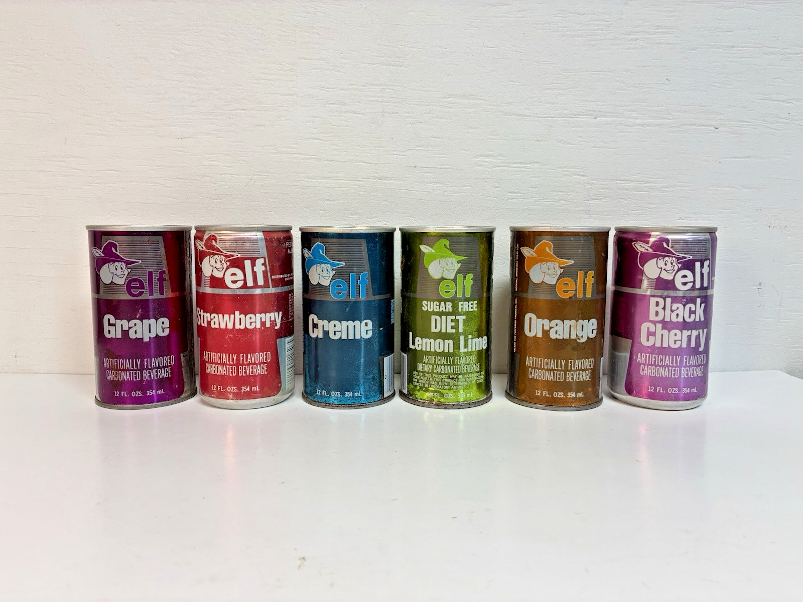 Six Vintage Elf Soda Cans | Grape. Strawberry, Creme, Lemon Lime, Orange, Cherry