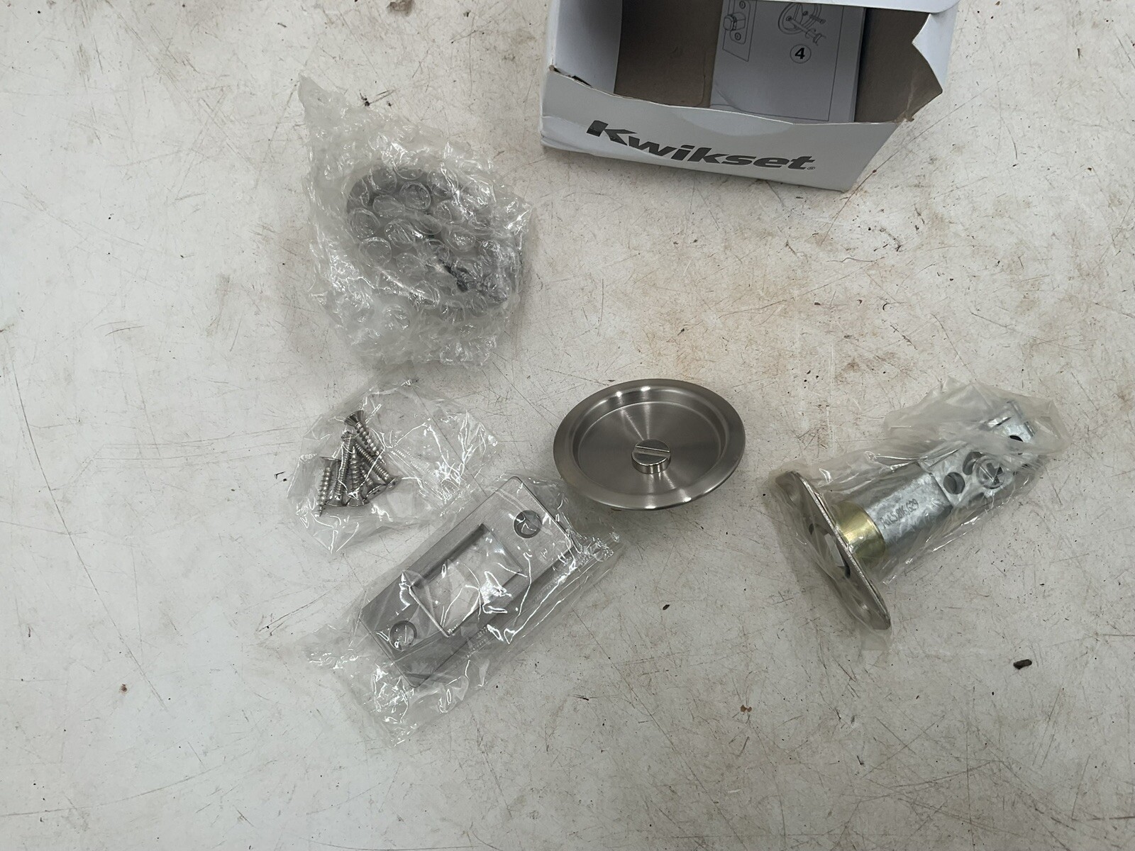 Kwikset 335 5 Round Bed/Bath Pocket Door Lock in Satin Nickle 93350-003