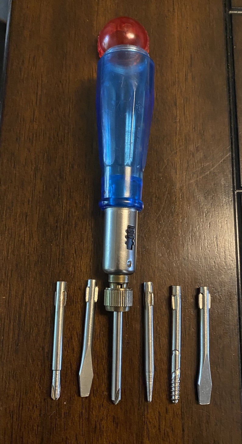 Vintage Ratcheting / Reversible Multi Bit Storage Handle Screwdriver - 7 Pc.