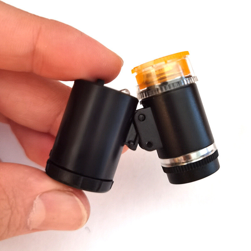 Black 60X LED UV Light Illuminated Pocket Microscope Loupe Magnifier document
