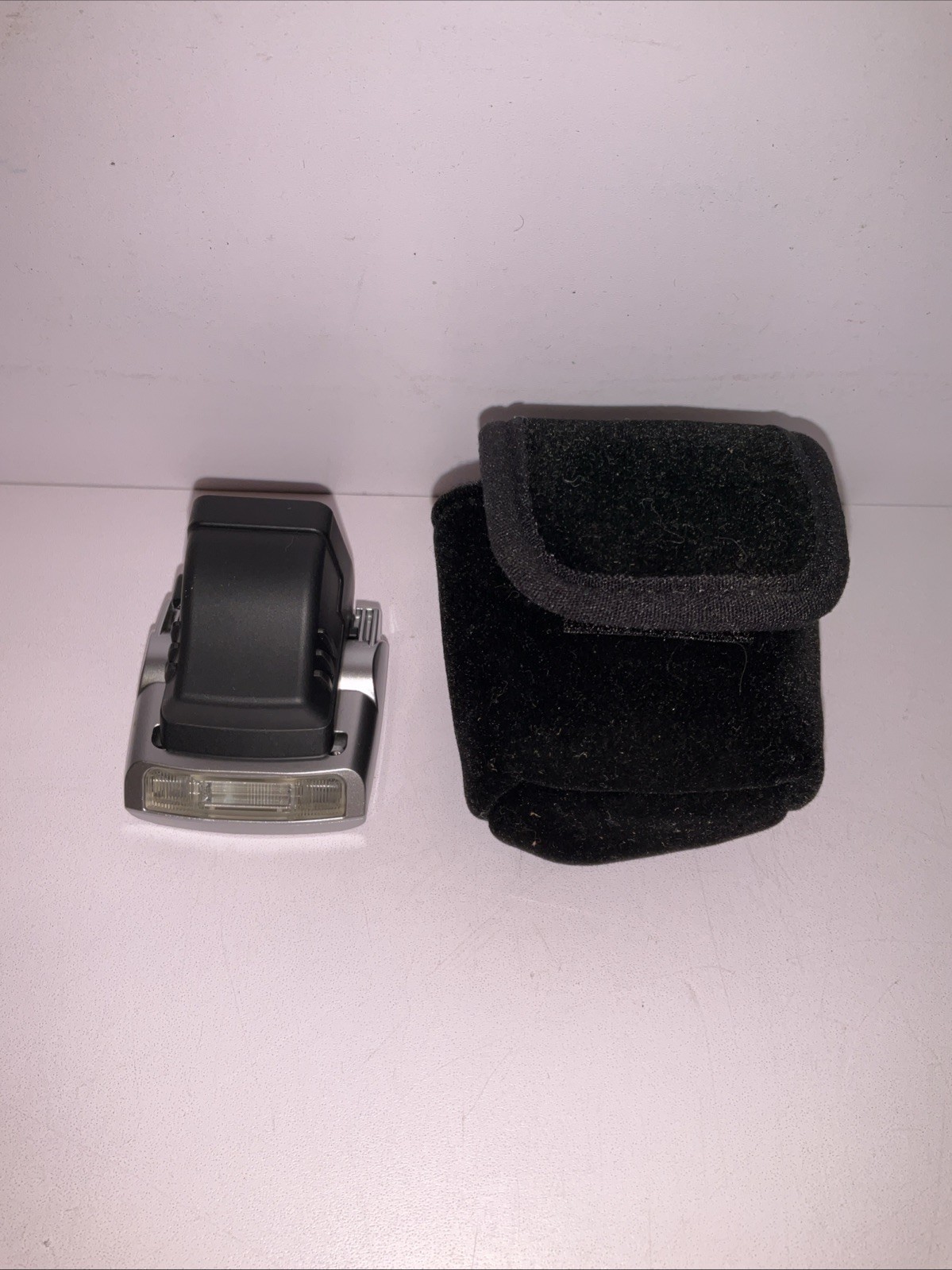 Compact FL-M1 Electronic Camera Flash in good working condition.