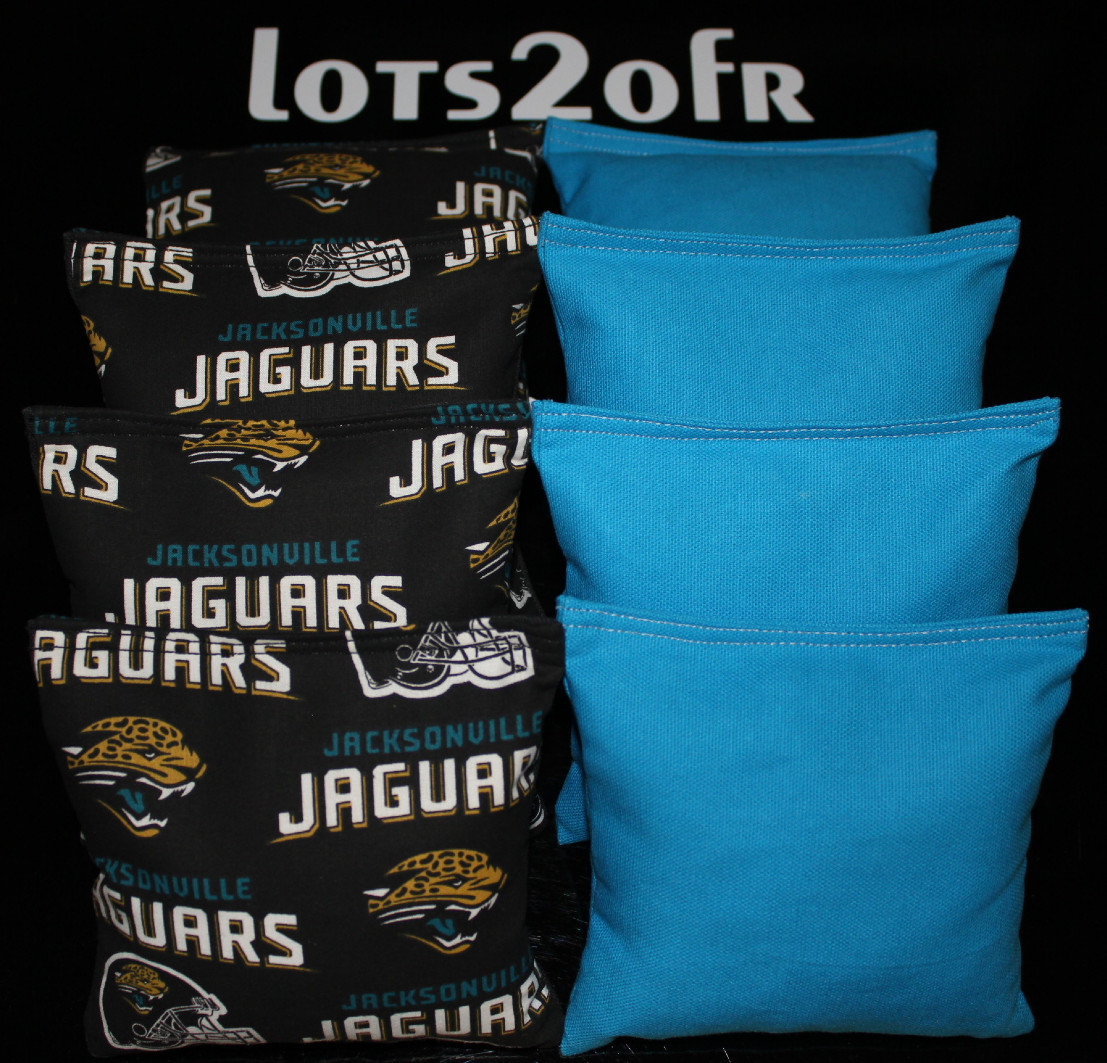 CORNHOLE BEAN BAGS w JACKSONVILLE JAGUARS fabric on both sides of logo game bags