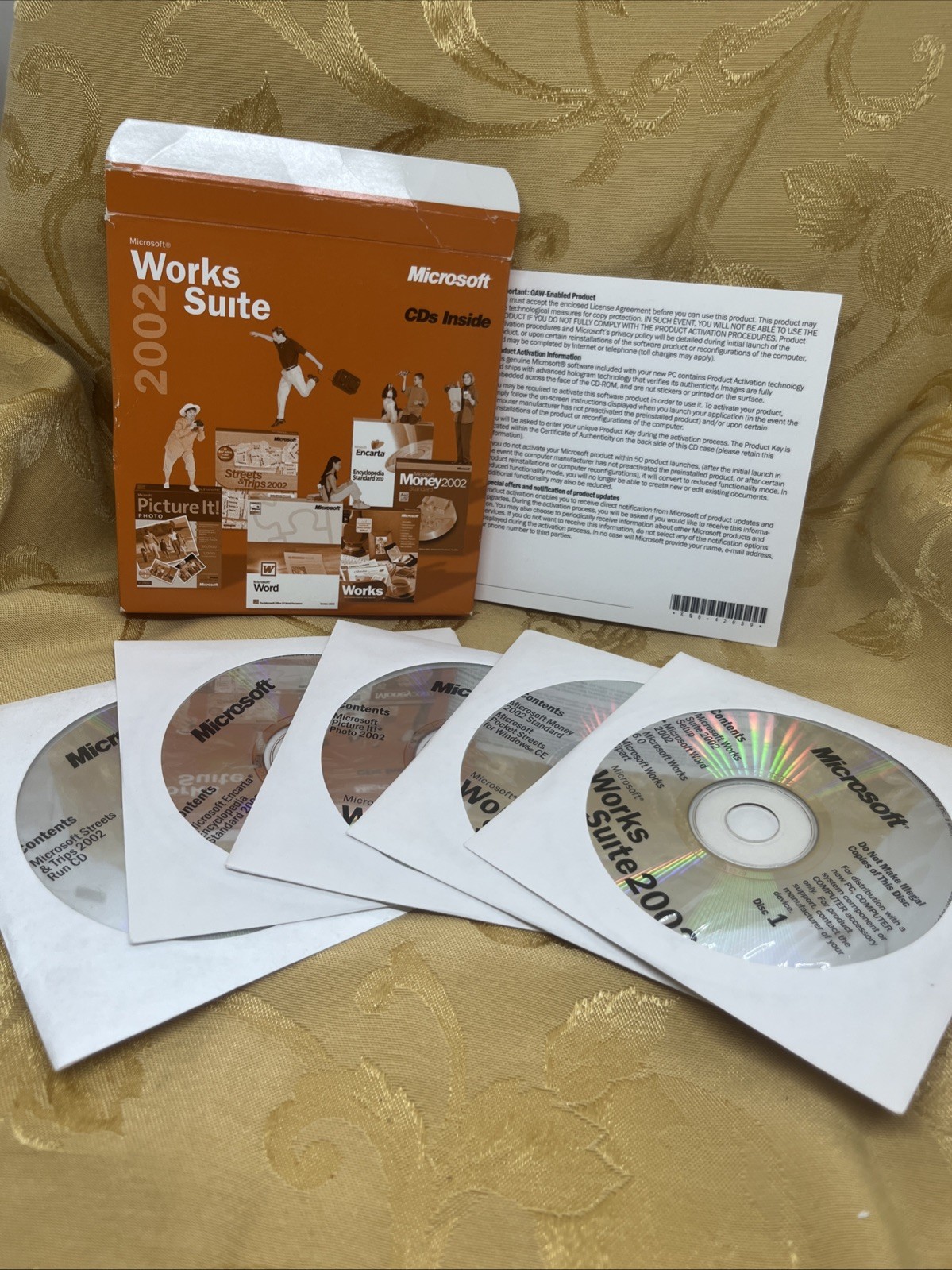 Microsoft Works Suite 2002 w/ product key (Word, Works, Money, Encarta, &c.)