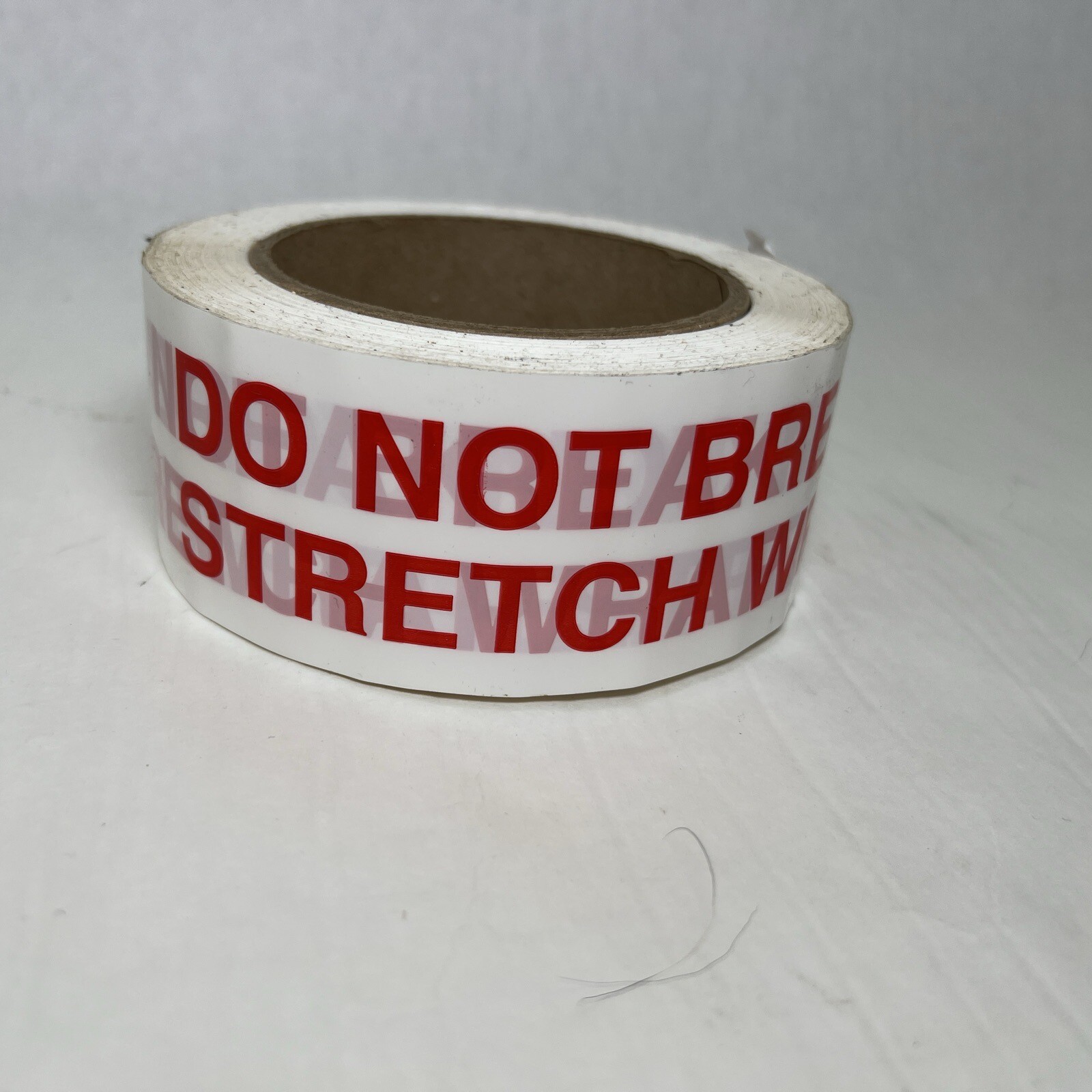 ADHESIVE White " Do Not Break Stretch Wrap " Red Ink , 2 In Wide