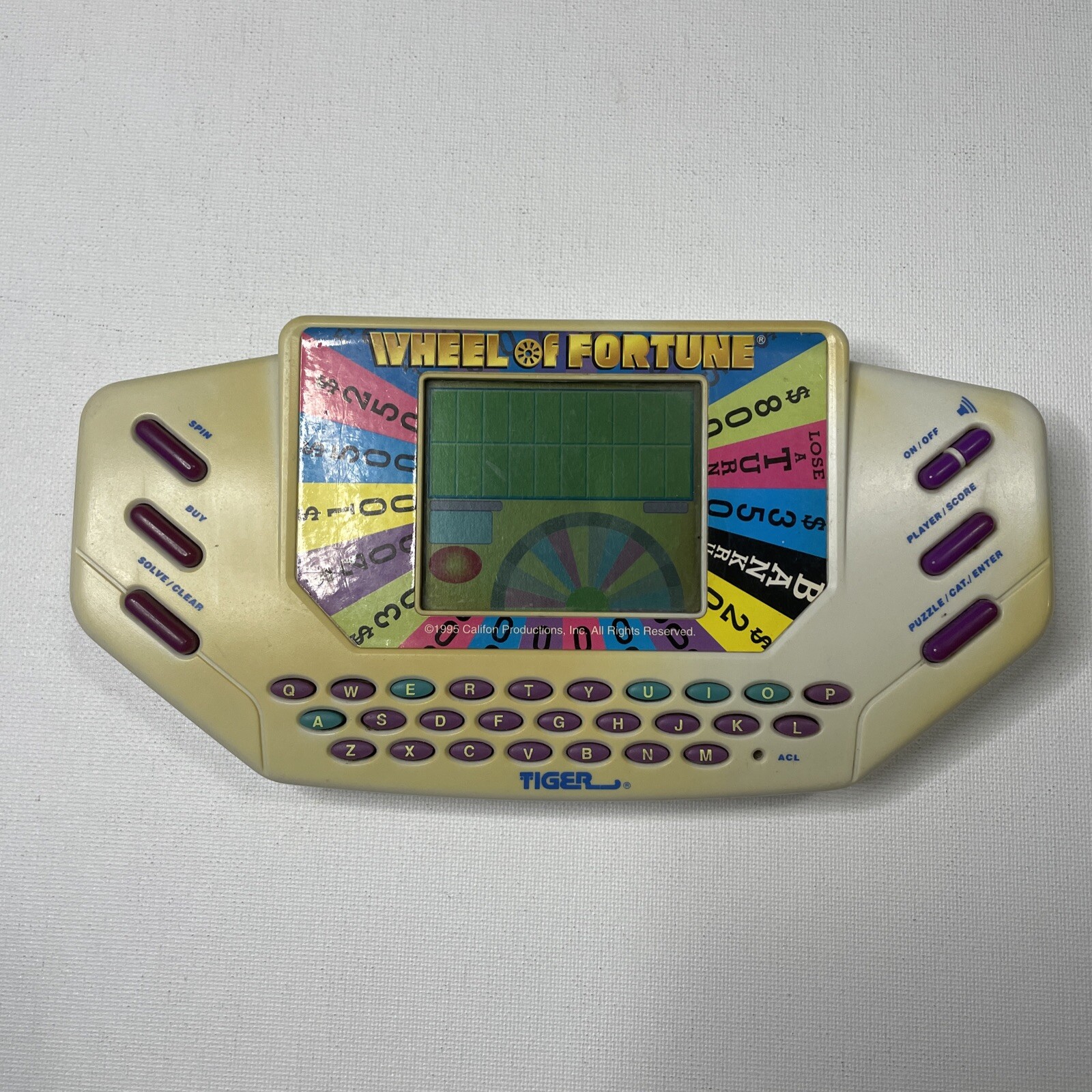 Wheel Of Fortune Electronic Handheld Game By Tiger - 1995 With Cartridge WORKS