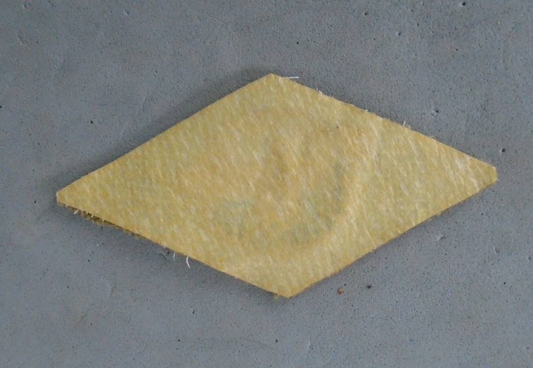 Ruptured duck patch on khaki with blue stripes