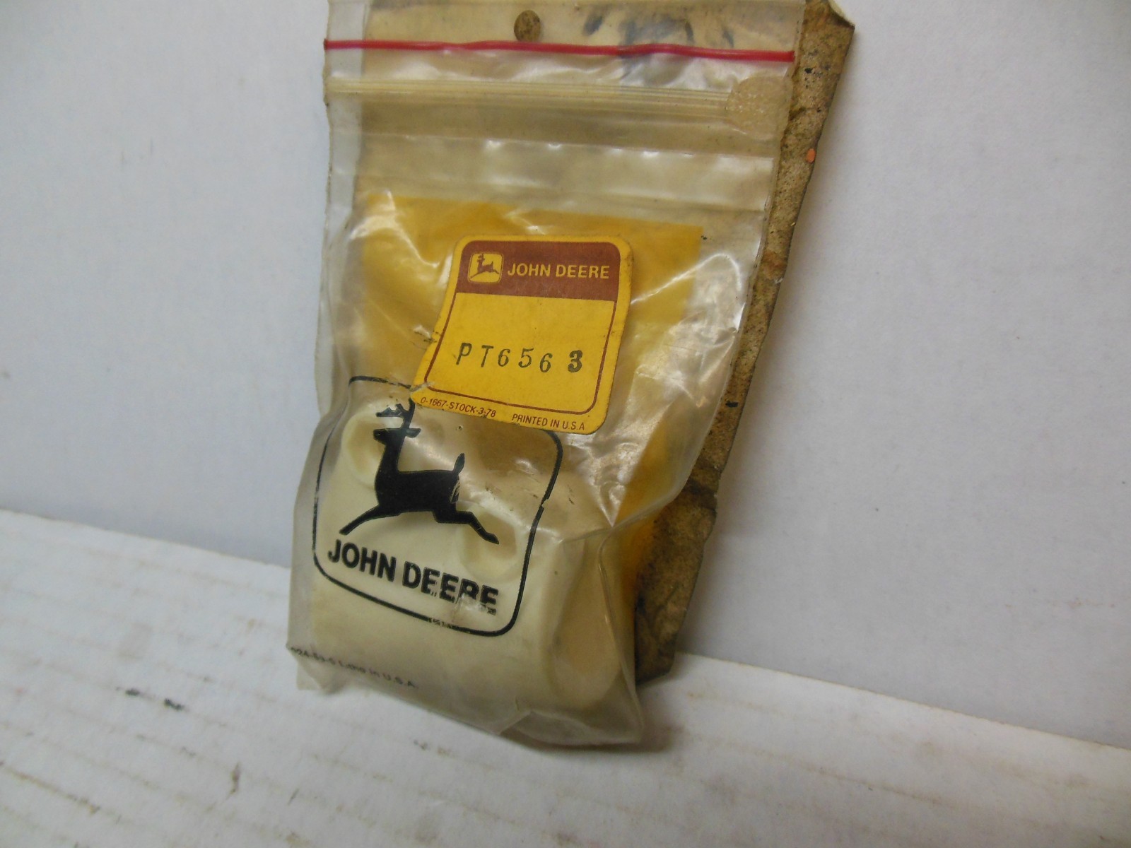 JOHN DEERE PLASTIC CLAMP BRACKET PT6563 OEM NOS