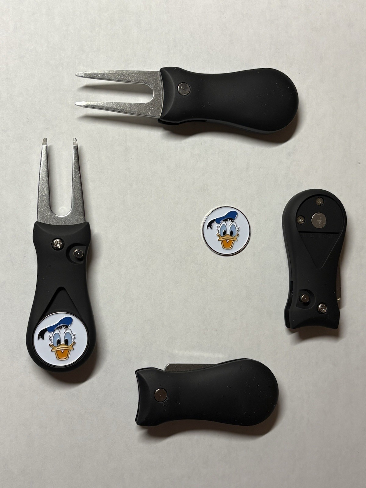 (1)  Switchblade Golf Divot Tool & (1) Donald Duck Disney 1" Coin Golf Marker
