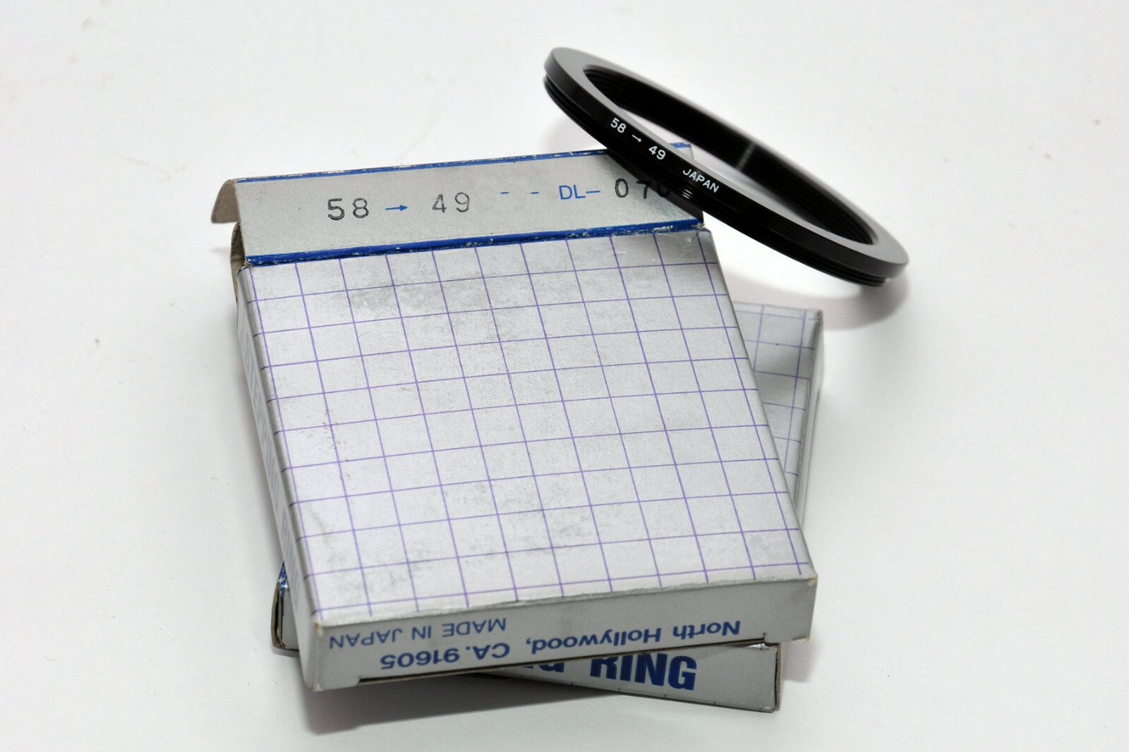 Dot Line  58mm-49mm Step-Down Ring New in Box (old stock)