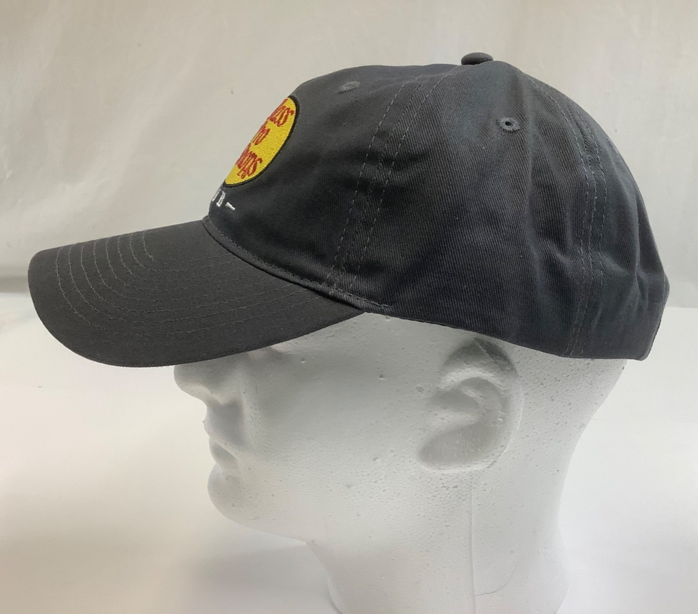 Bass Pro Shops Club Cap in dark gray with fish, adjustable to fit most people