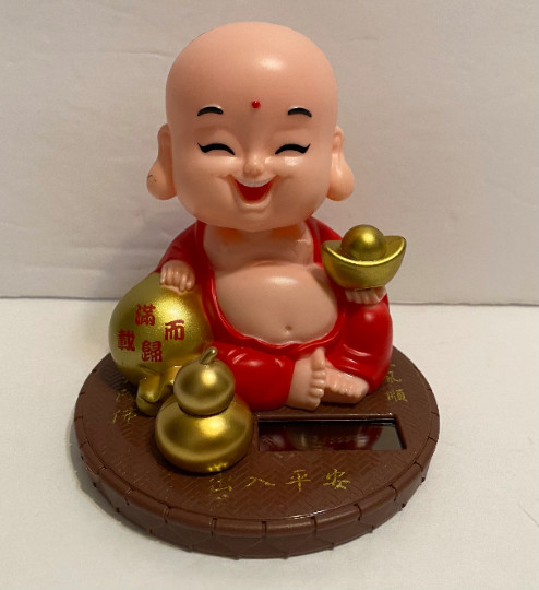SOLAR POWERED Happy BUDDHA With yuan bao figuire Toy-return with a rewarding