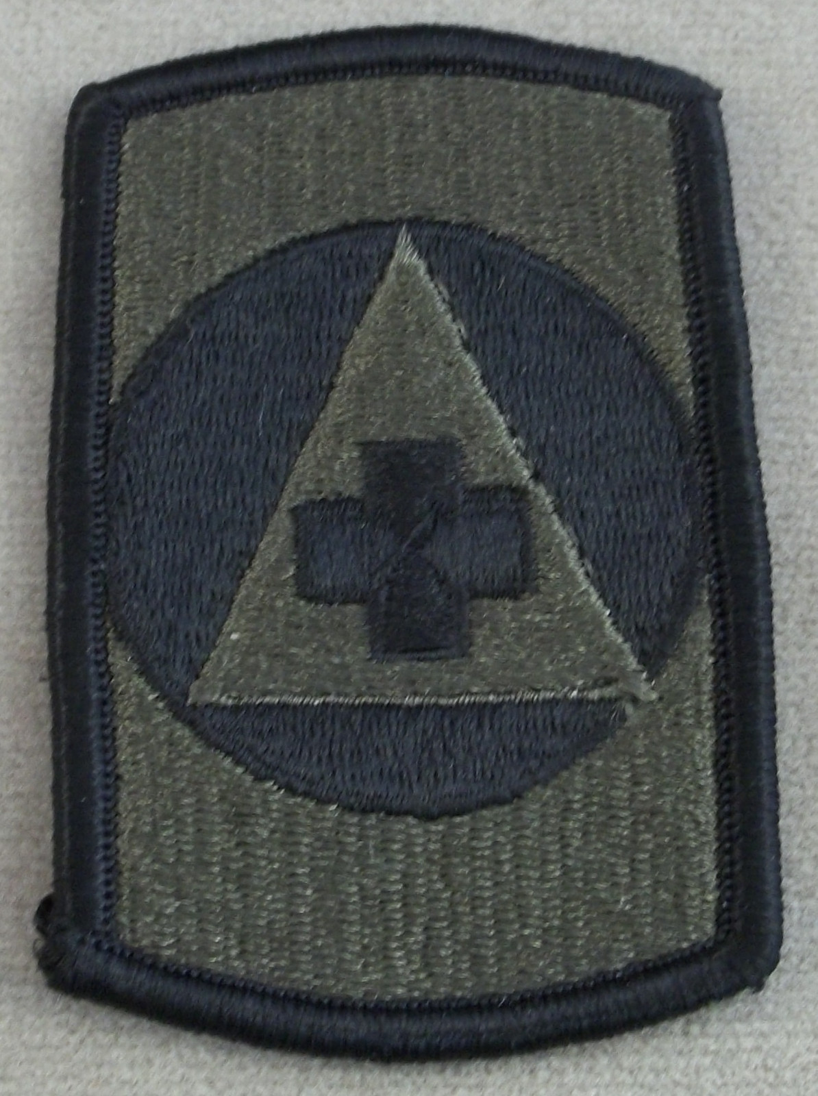 US Army 426th Medical Brigade Subdued Merrowed Edge Patch