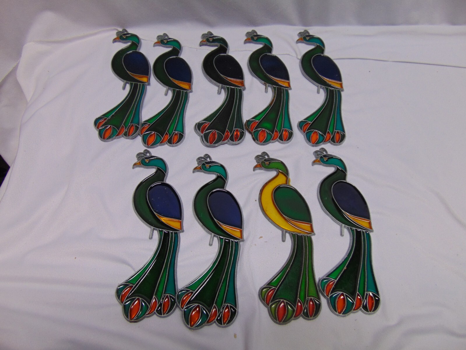(9) Parrot Sun Catchers plastic w/ metal Frame Very colorful 2.5" x 8.5"