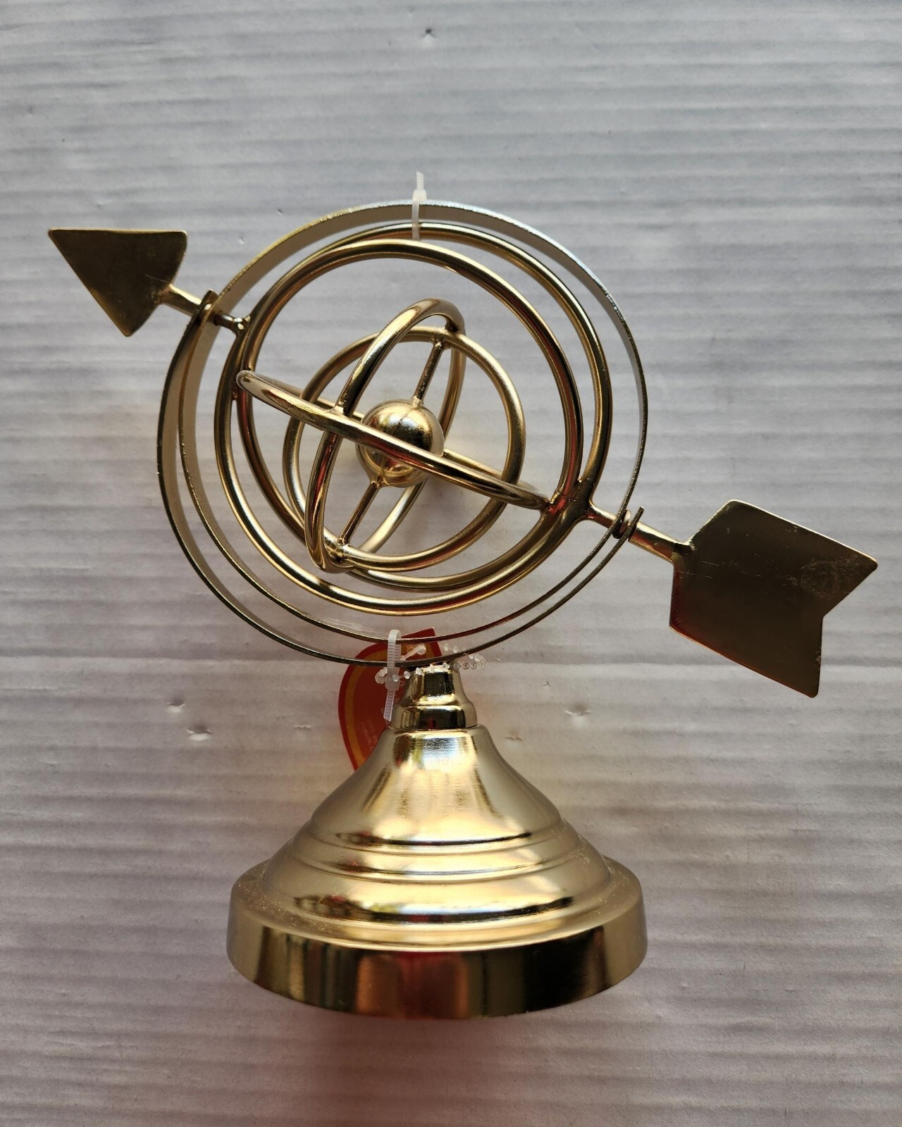 8" x 10"  Metal Globe with Golden Spinning Arrow - Beautifully Crafted in India