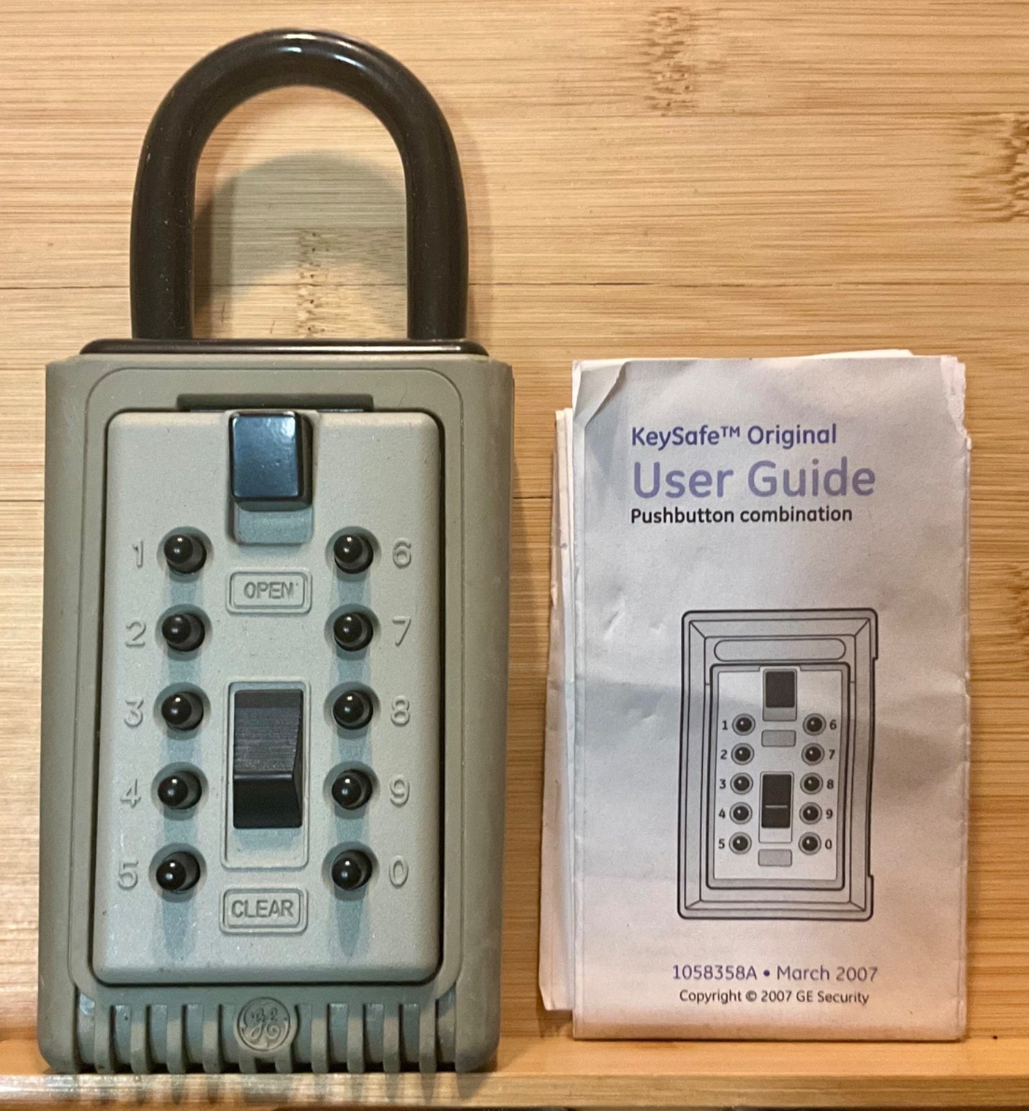 G.E. pushbutton Keysafe, new open box.