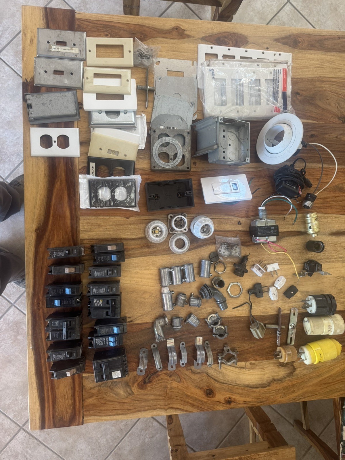 Electrician’s Junk Drawer (not junk) circuit breakers, Boxes, conduit fittings