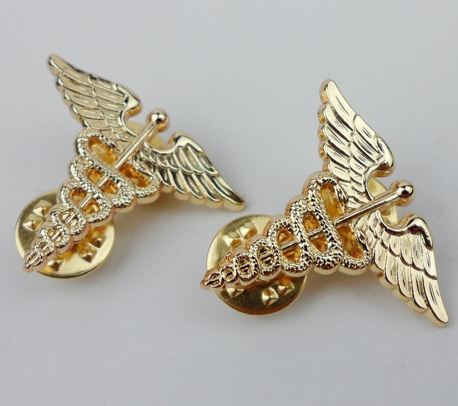 PAIR OF US ARMY MEDICAL CORPS METAL BADGE PIN INSIGNIA