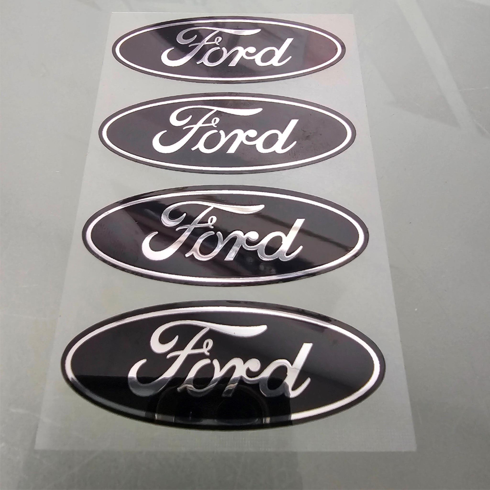 4-FORD CENTER CAP LOGOS BLACK OVAL DECALS VINYL F150 F250 MUSTANG FOCUS FUSION