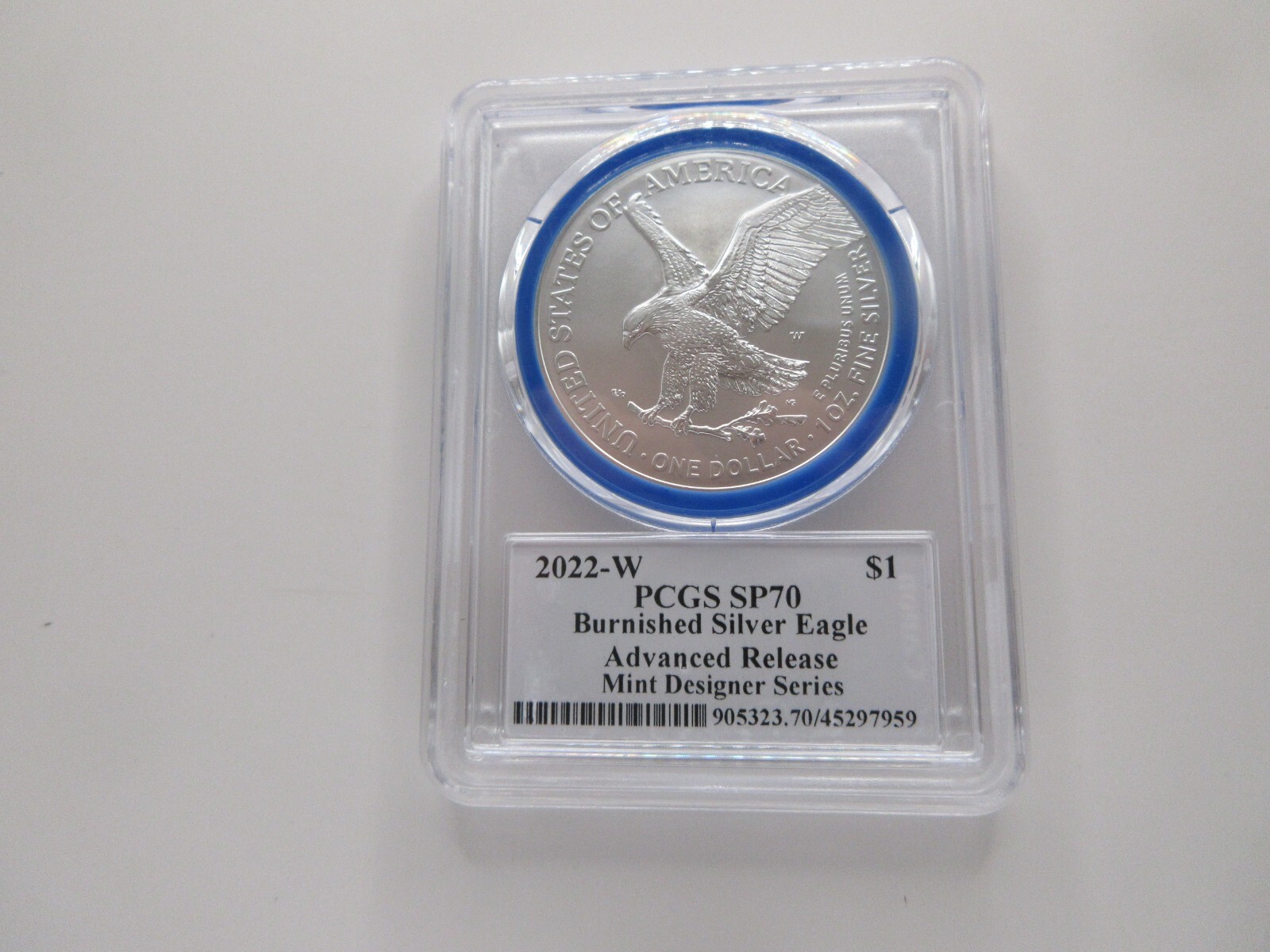 2022-W Burnished Silver Eagle Advanced Release; Mint Designer Damstra PCGS SP70