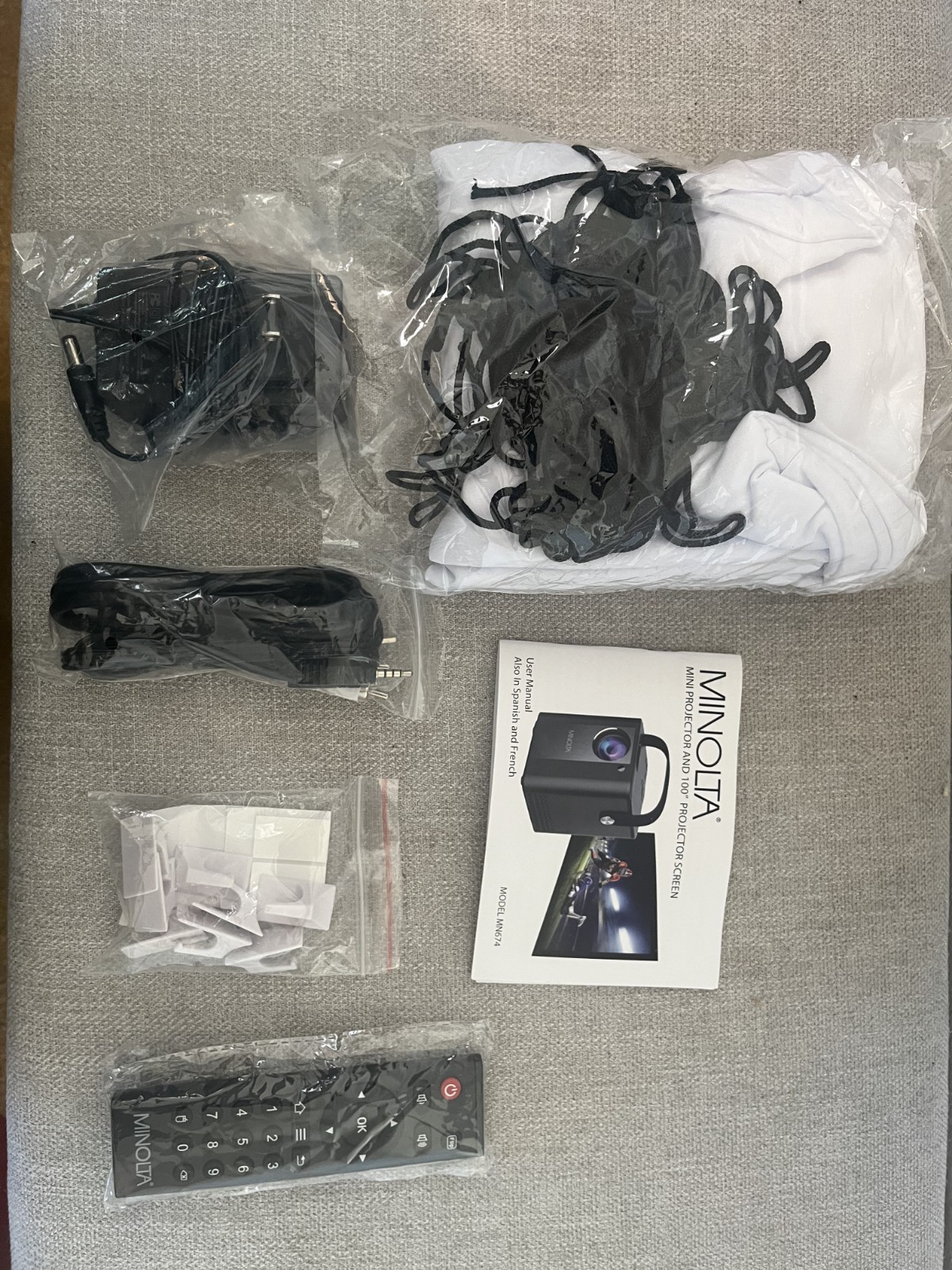 Minolta Mini Projector Bundle 1080P HD w/ 100" Screen, Remote, HDMI/USB/Micro-SD