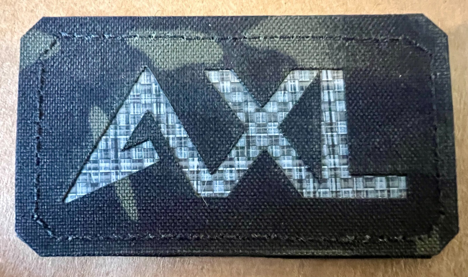 AXL Multicam Black Logo Tegris Backing Patch