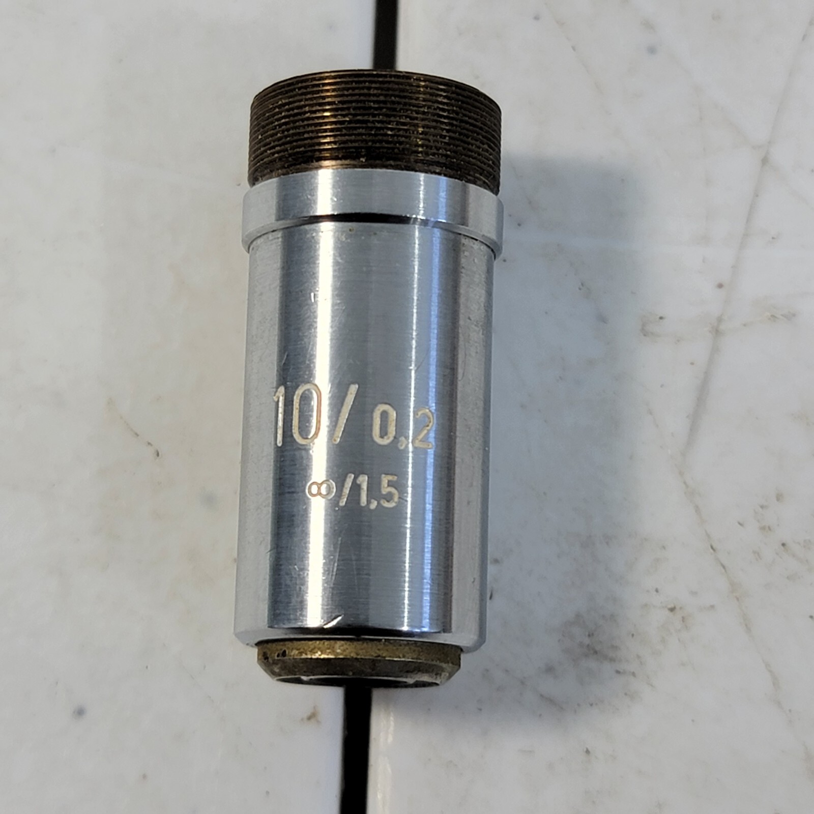 ZEISS 10x Epiplan Microscope Objective 10/0,2 Inf/1,5 w/ White Text