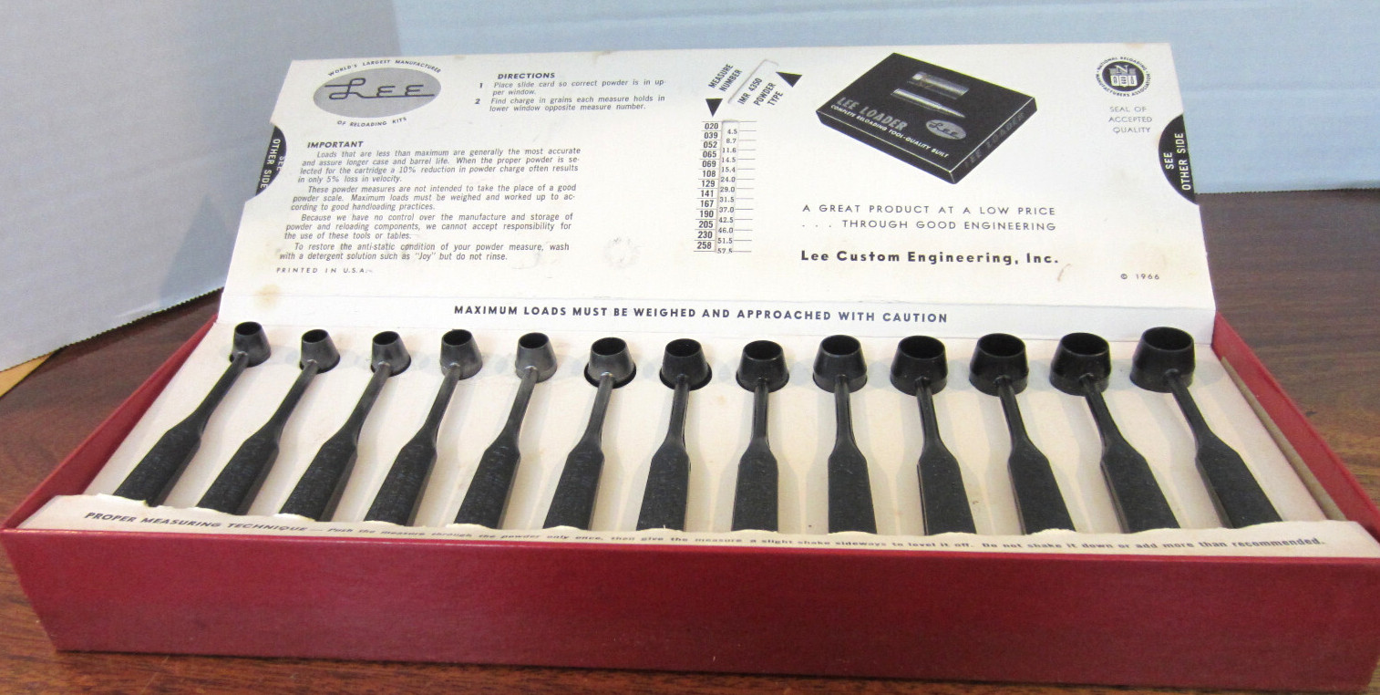 Lee  powder measure kit with 13 measuring spoons and slide chart for reloading