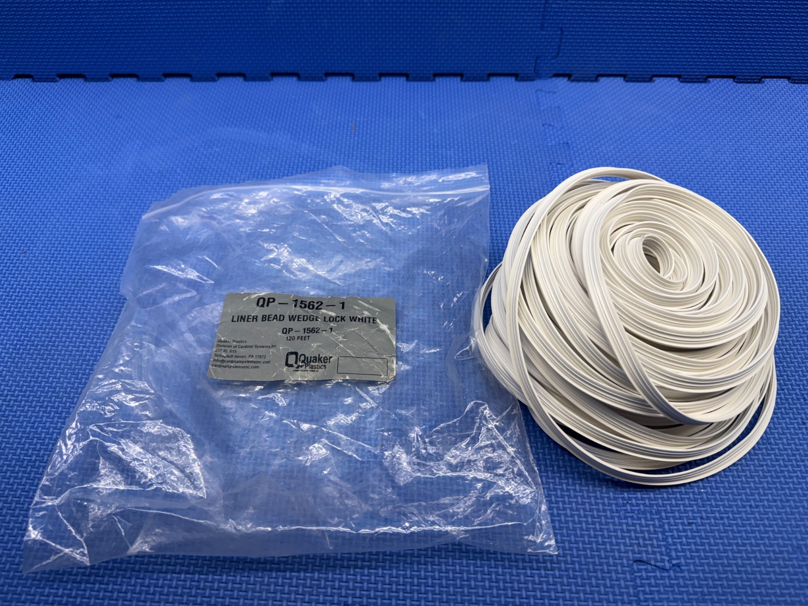 Quaker Plastics QP-1562-1 Pool 120' White Vinyl Linear Bead Wedge Lock