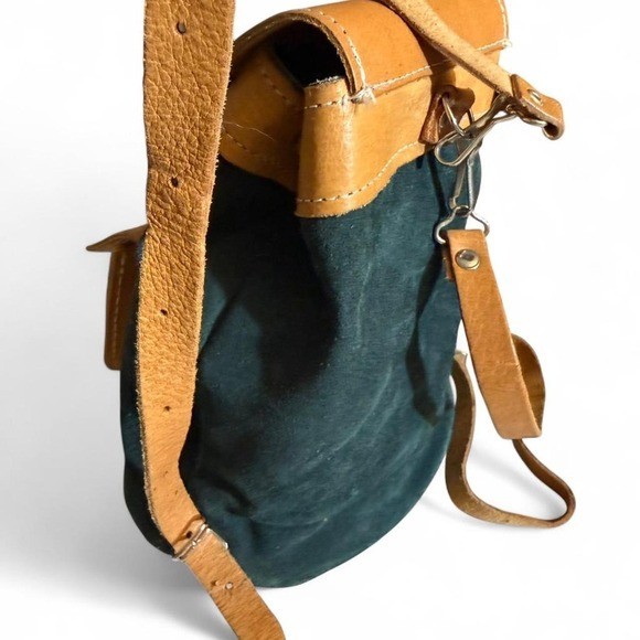 Forest Green Suede and Tan Leather backpack with adjustable straps.
