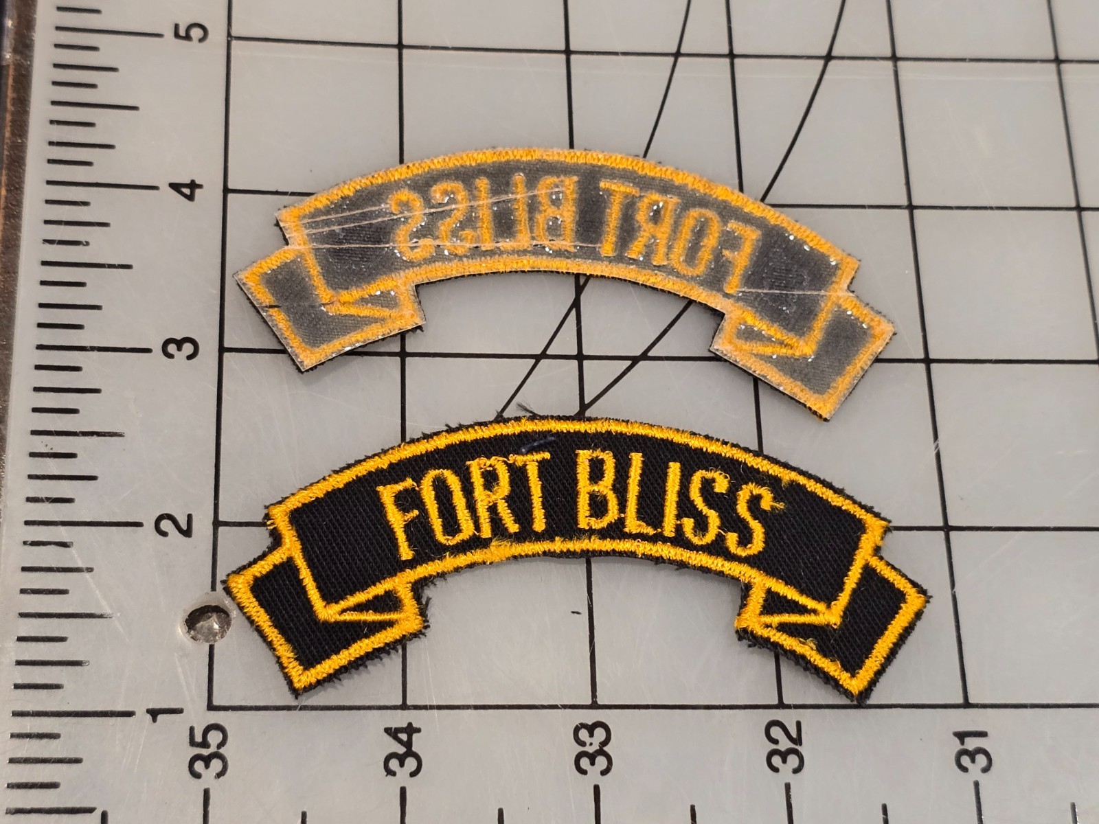 Surplus US Military Tab Fort Bliss Glue Back Cut Edge 4536