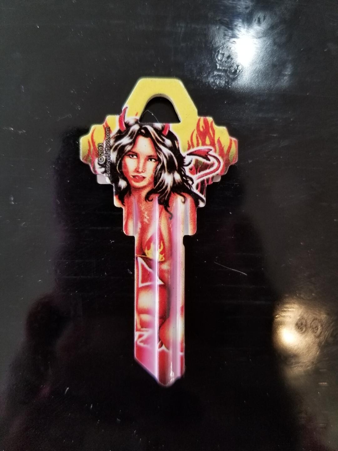 DEVIL GIRL PRINTED SCHLAGE SC1 KEYBLANK (DISCONTINUED) - READ DETAILS BELOW
