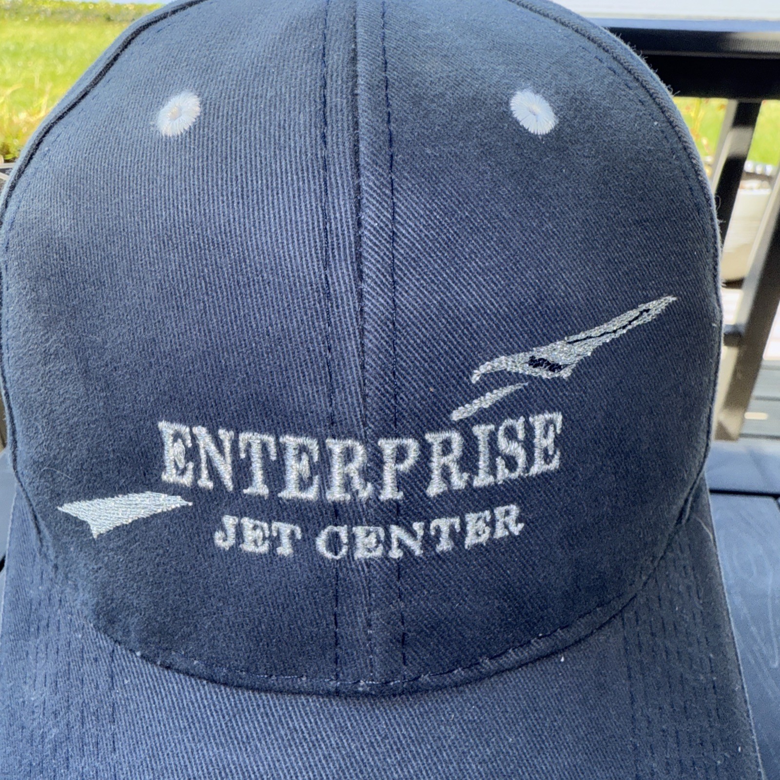 Enterprise Jet Center w Jet in Silver on Blue Hat Cap KHOU on Back Hook Loop